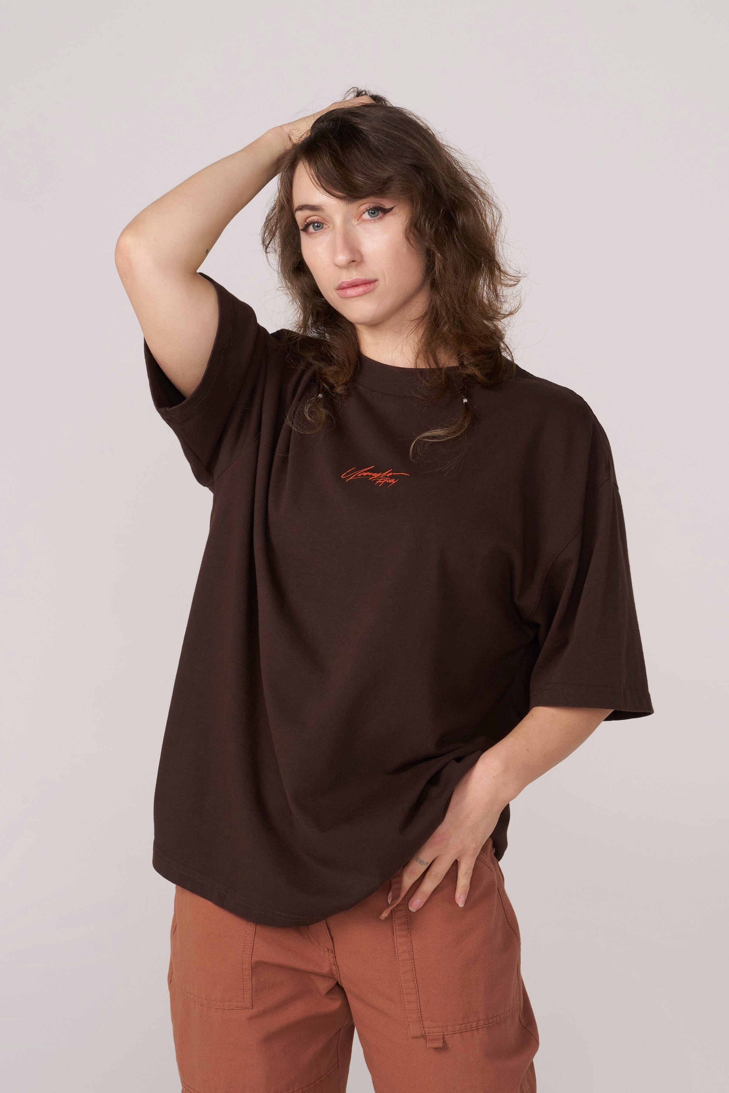 Close-up of Lean Beef Patty signature detail on oversized tee