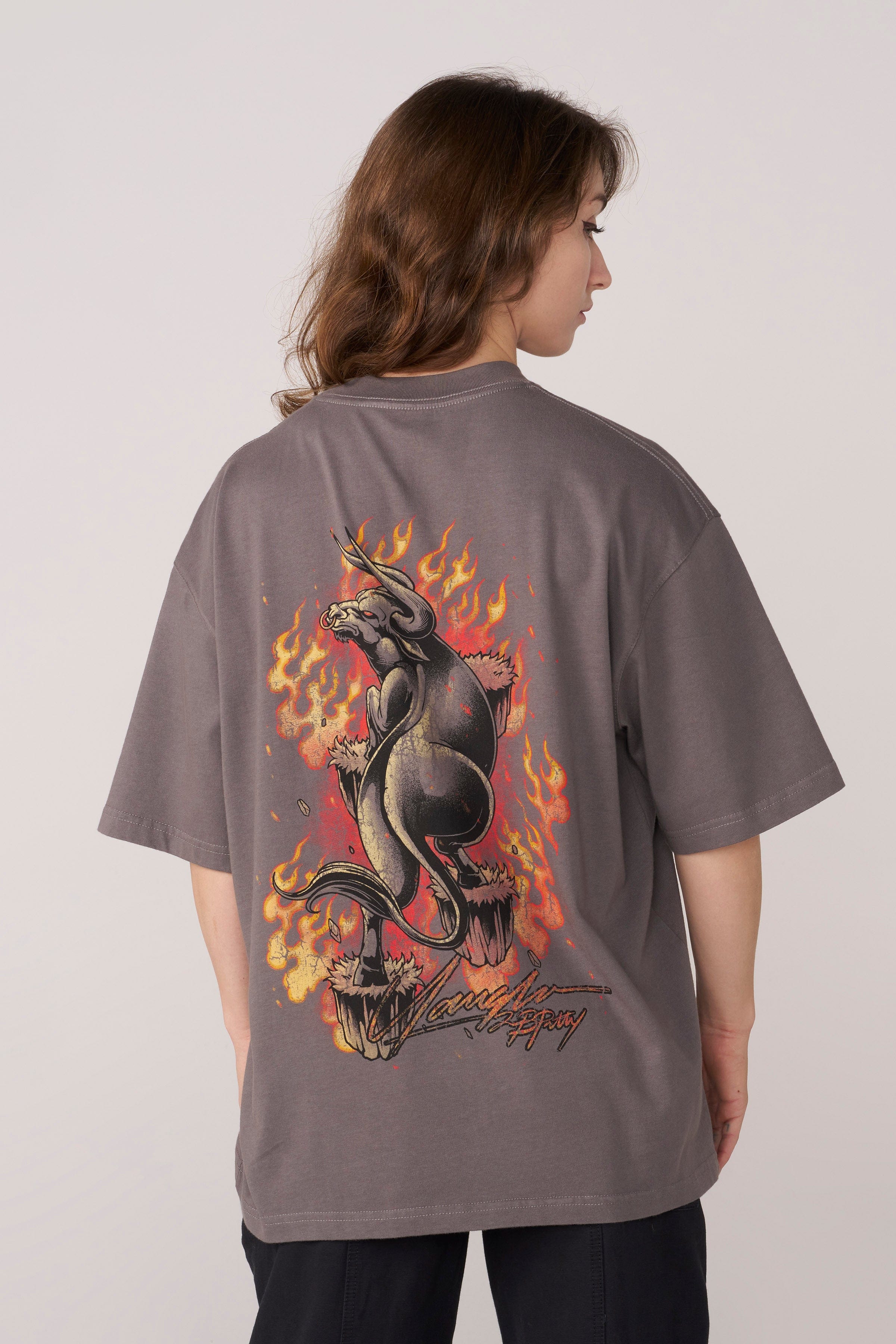 Front view of oversized gym shirt on model, relaxed fit for training
