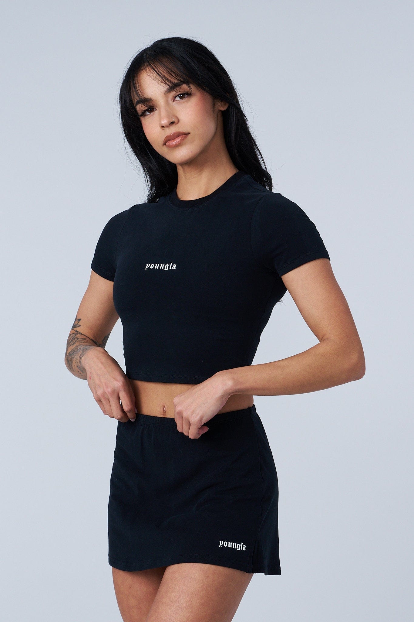 Front view of the chic baby tee, showcasing its soft fabric and fit.