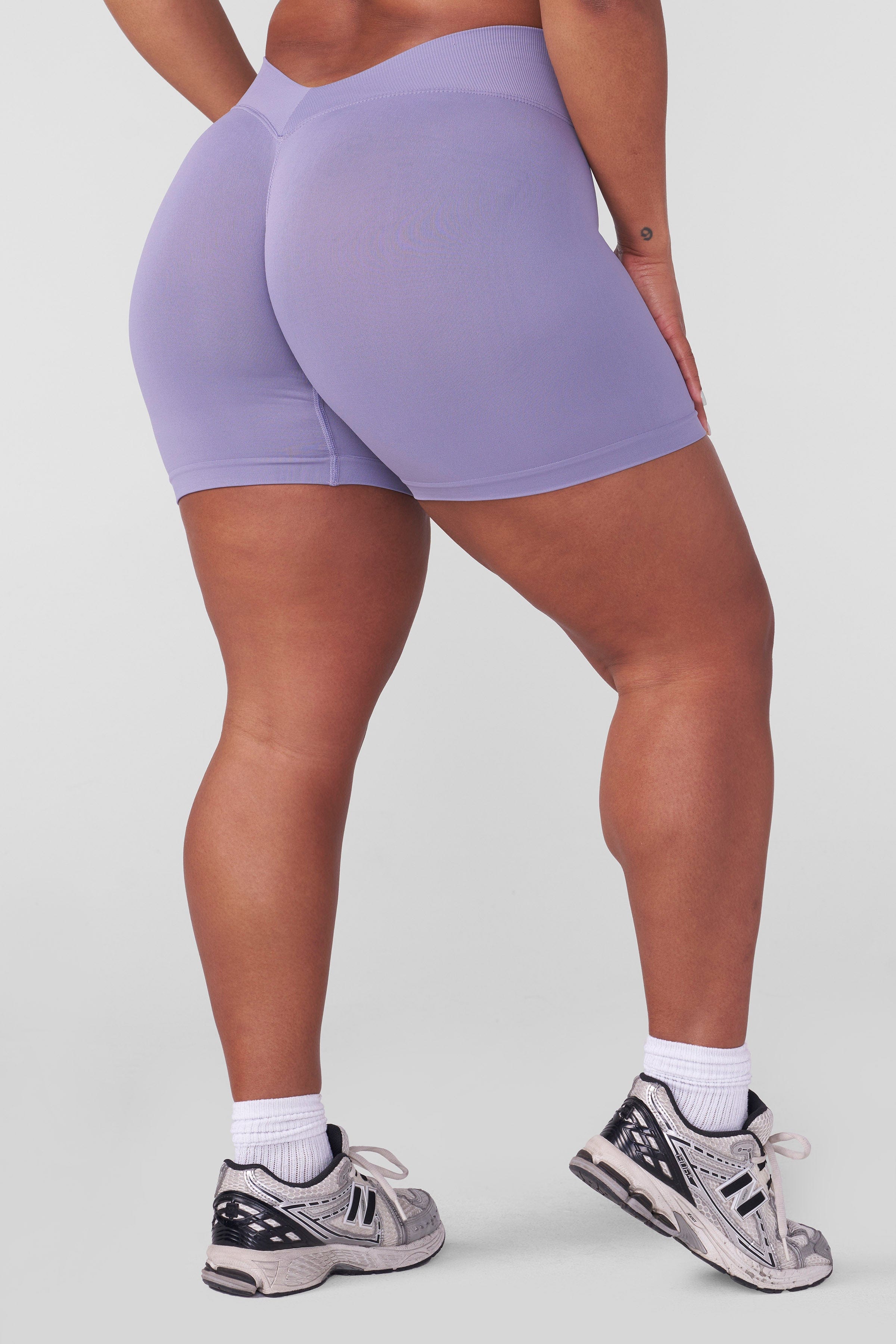 Front view of SculptLift seamless gym shorts showcasing the V-back seam.