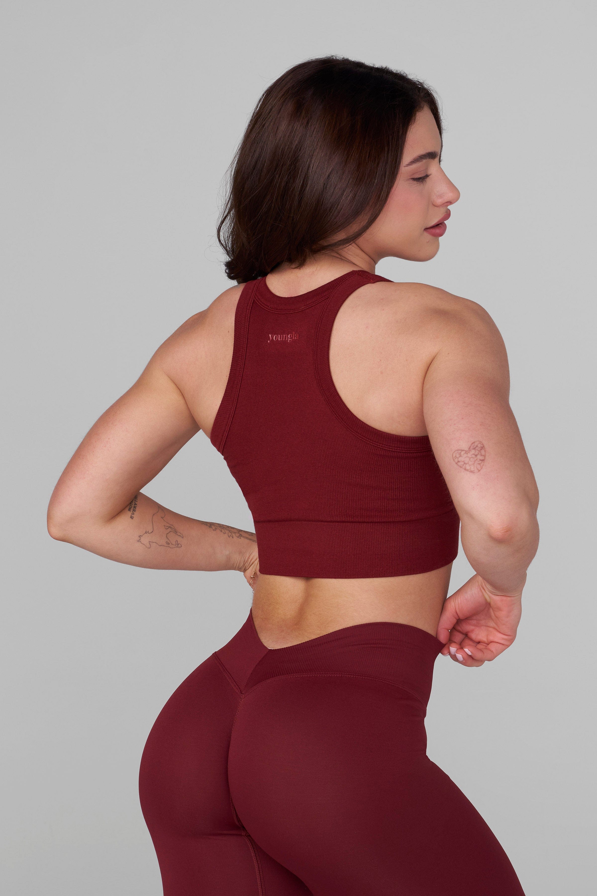 Side view of the seamless sports bra highlighting its ribbed texture and fit.