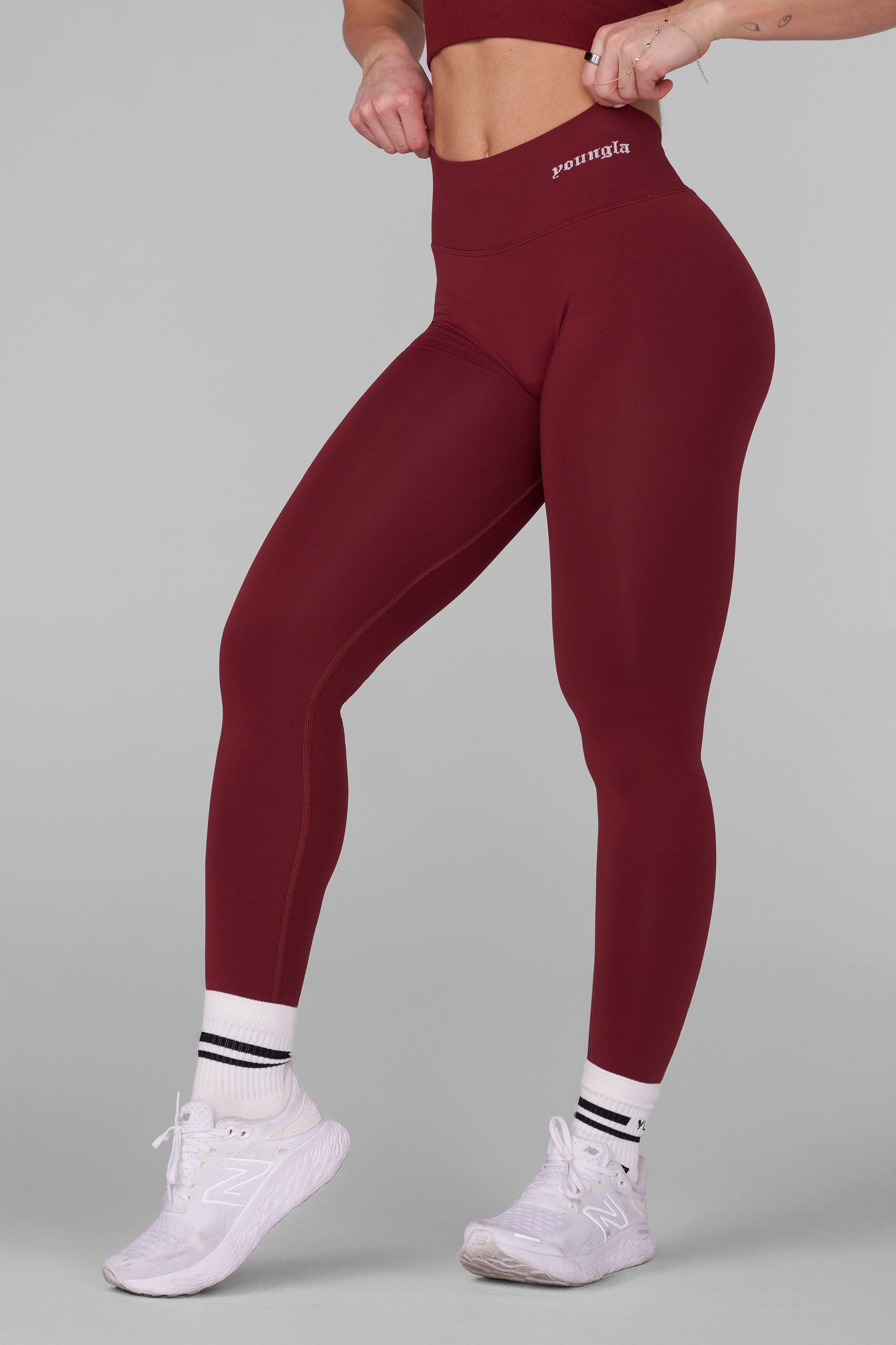 Woman in seamless leggings stretching, showing flexibility and comfort