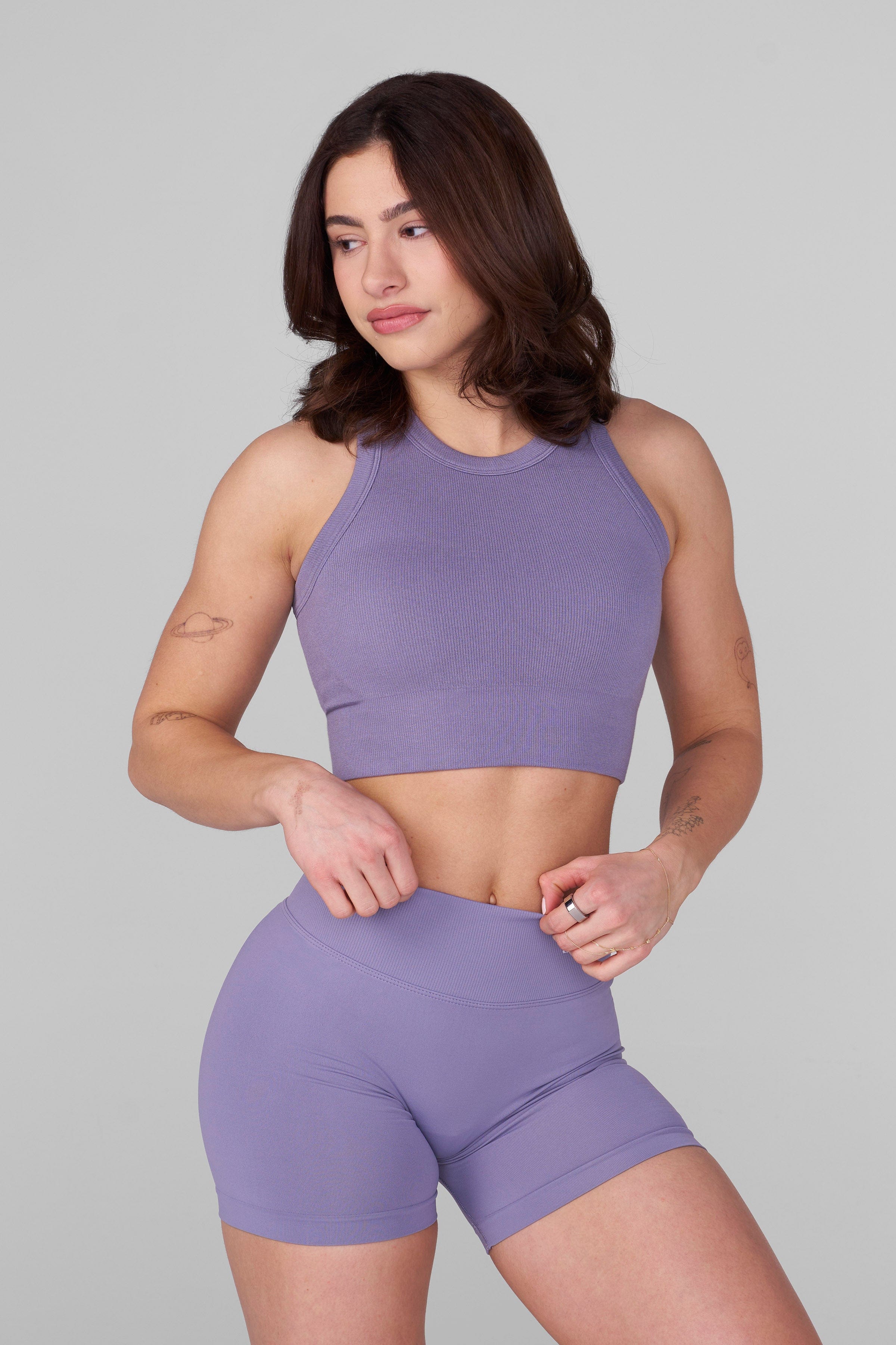 Front view of the Lift Seamless High Neck Sports Bra in action during a workout.