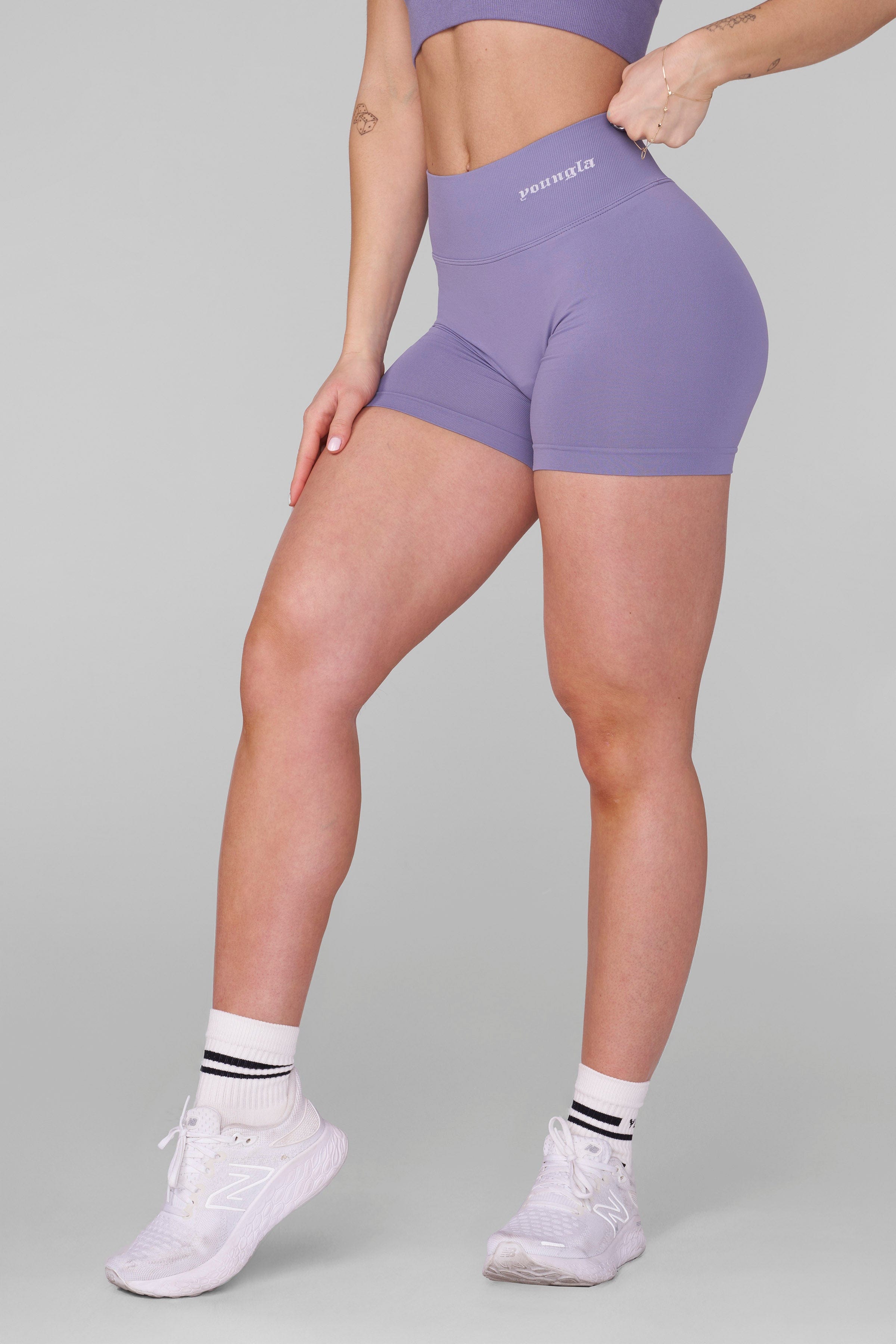 Front view of SculptLift seamless gym shorts showcasing the V-back seam.