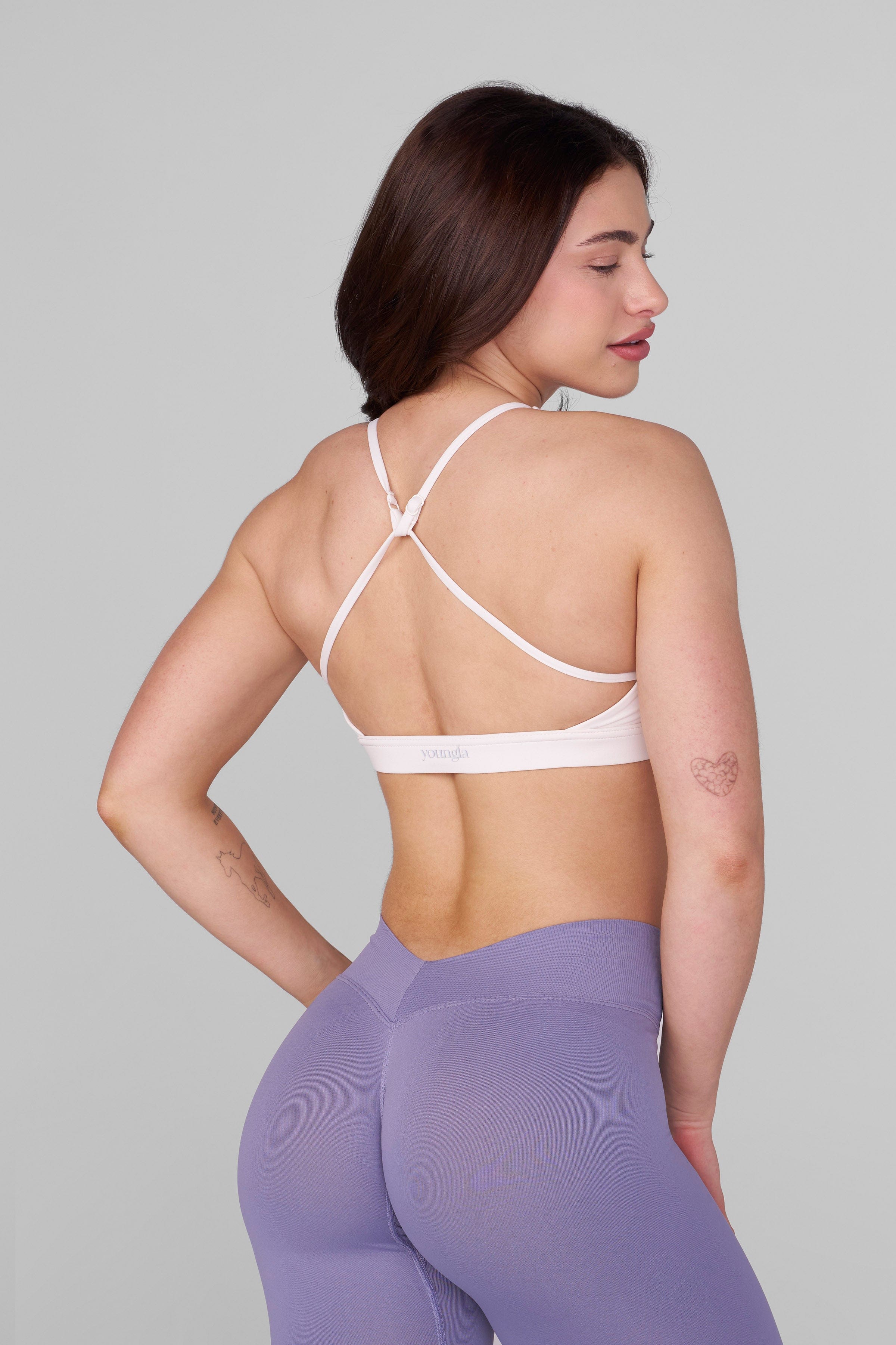 Chic cross-back design of the high support sports bra.