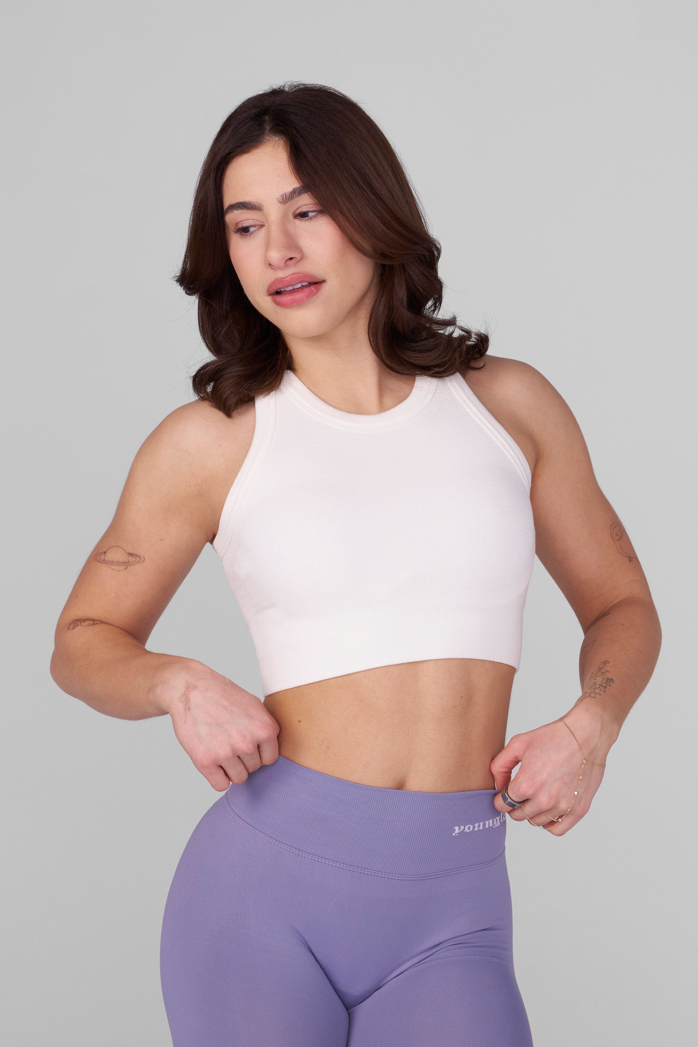 Front view of the Lift Seamless High Neck Sports Bra in action during a workout.