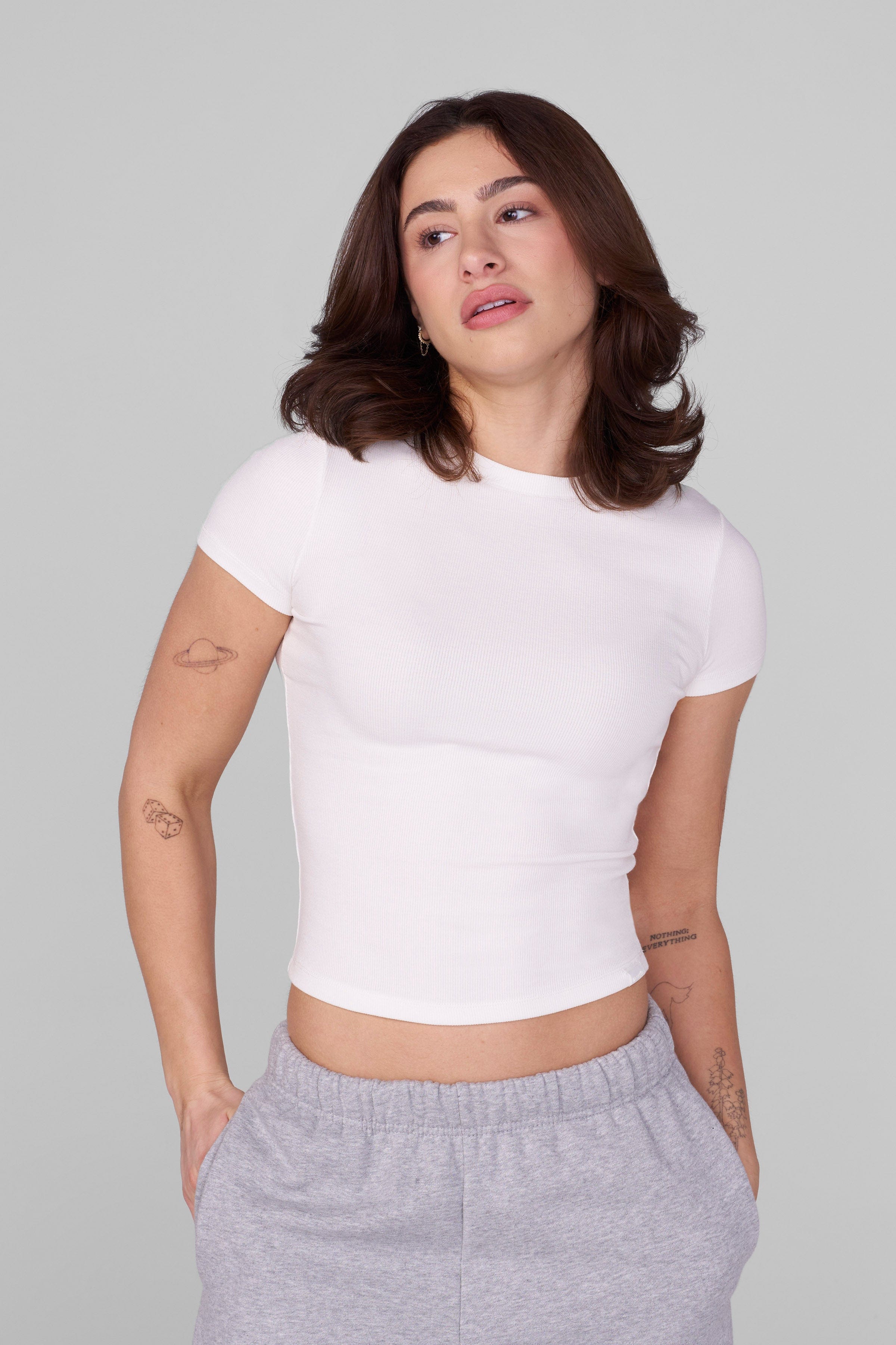 Front view of the womens baby tee highlighting its soft ribbed texture.