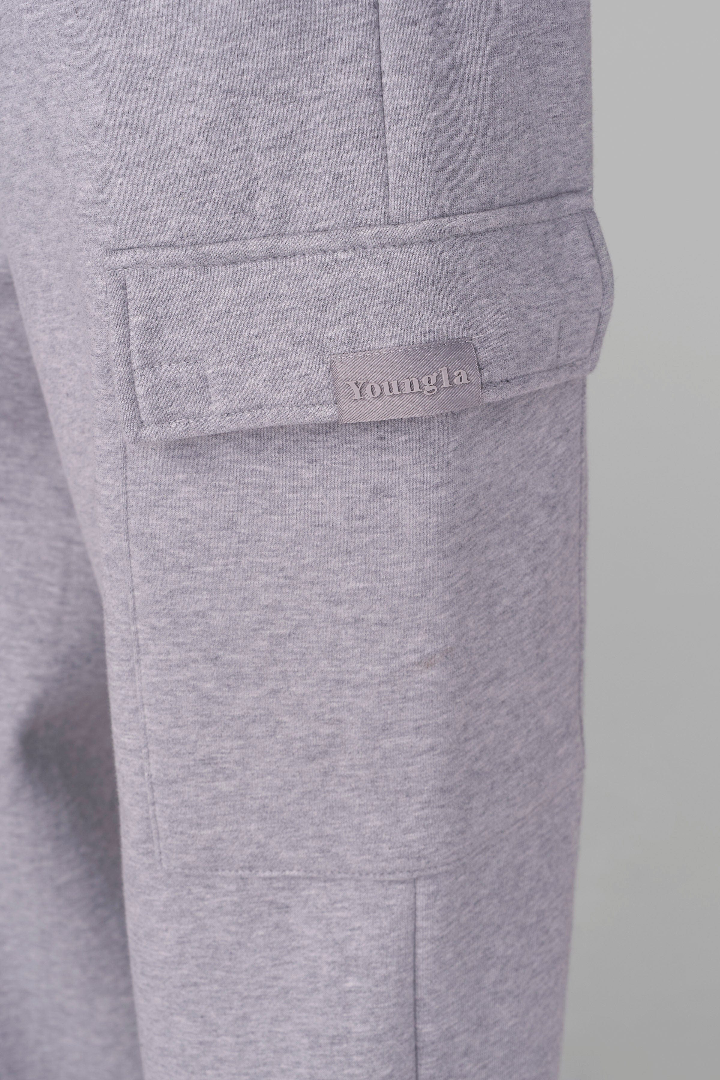 Side angle showing the relaxed silhouette and internal drawstring of mens cargo joggers