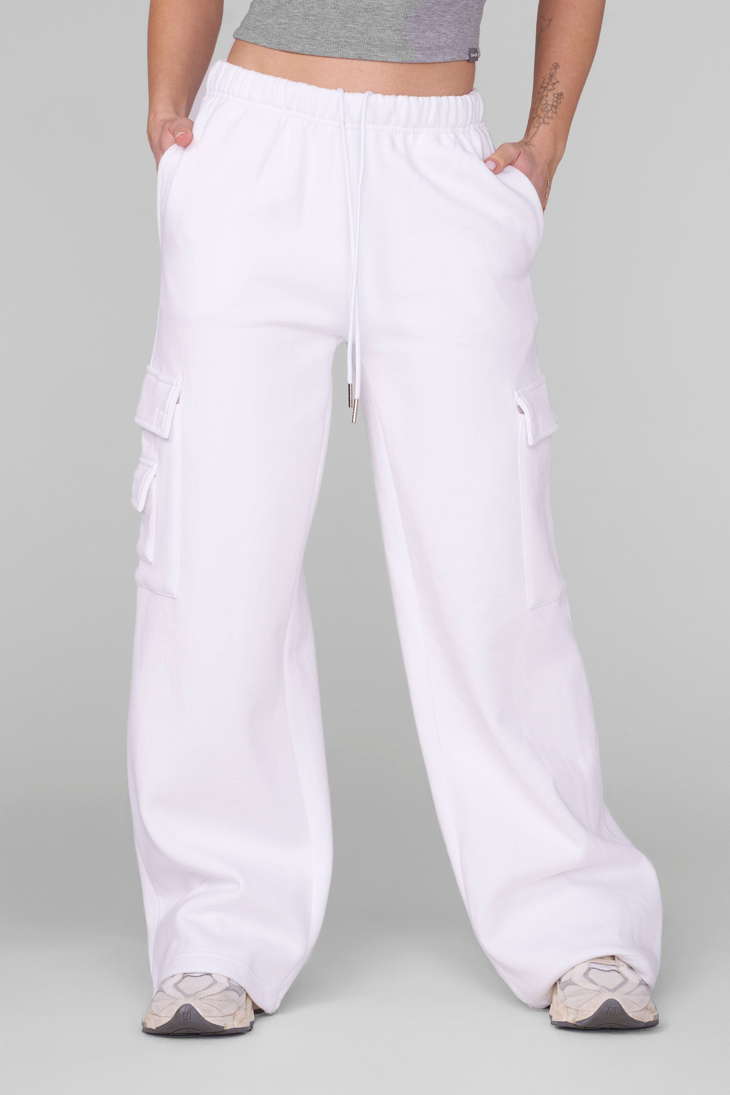 Side angle showing the relaxed silhouette and internal drawstring of mens cargo joggers