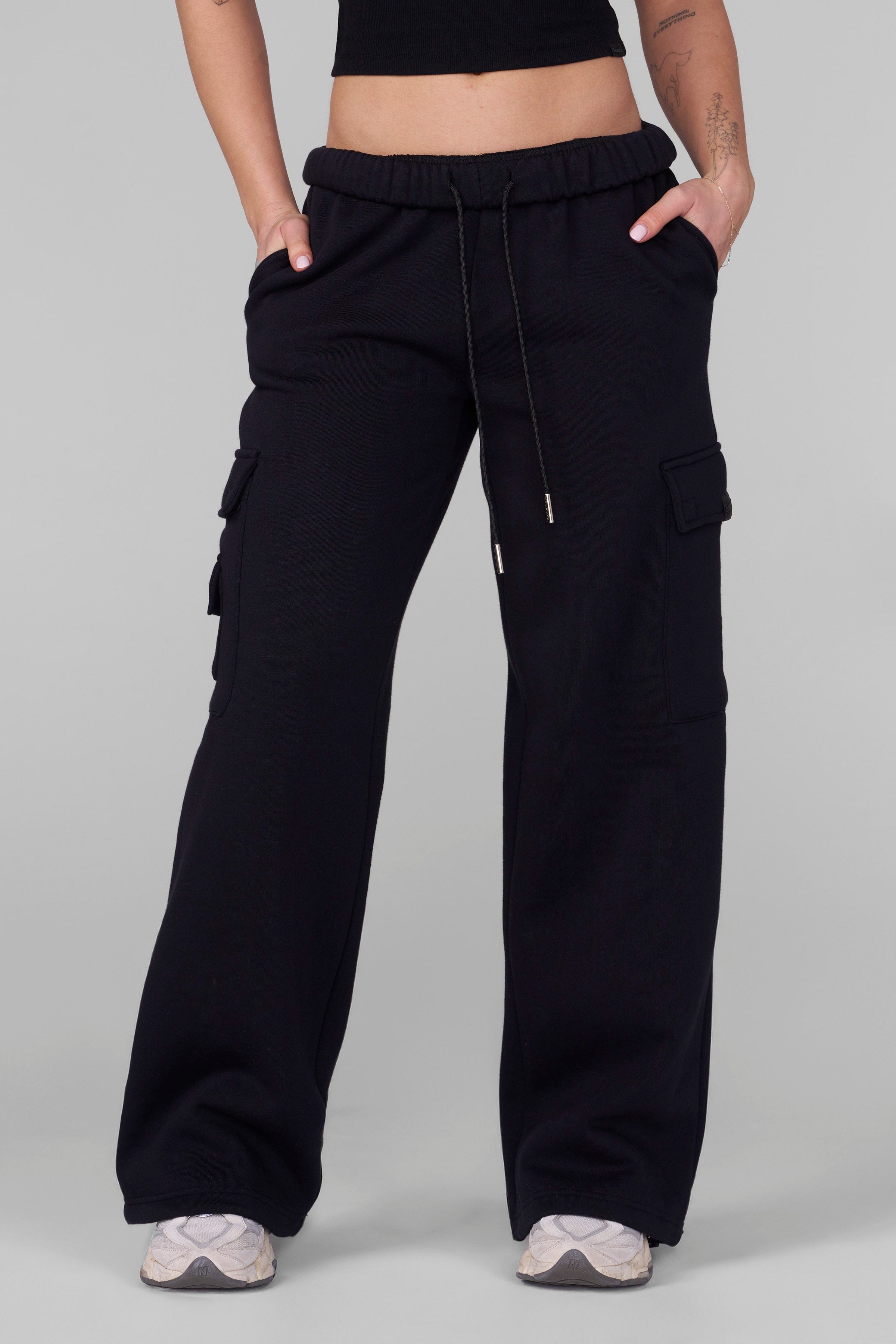 Back view highlighting the minimal design and comfort of cargo joggers women and men love