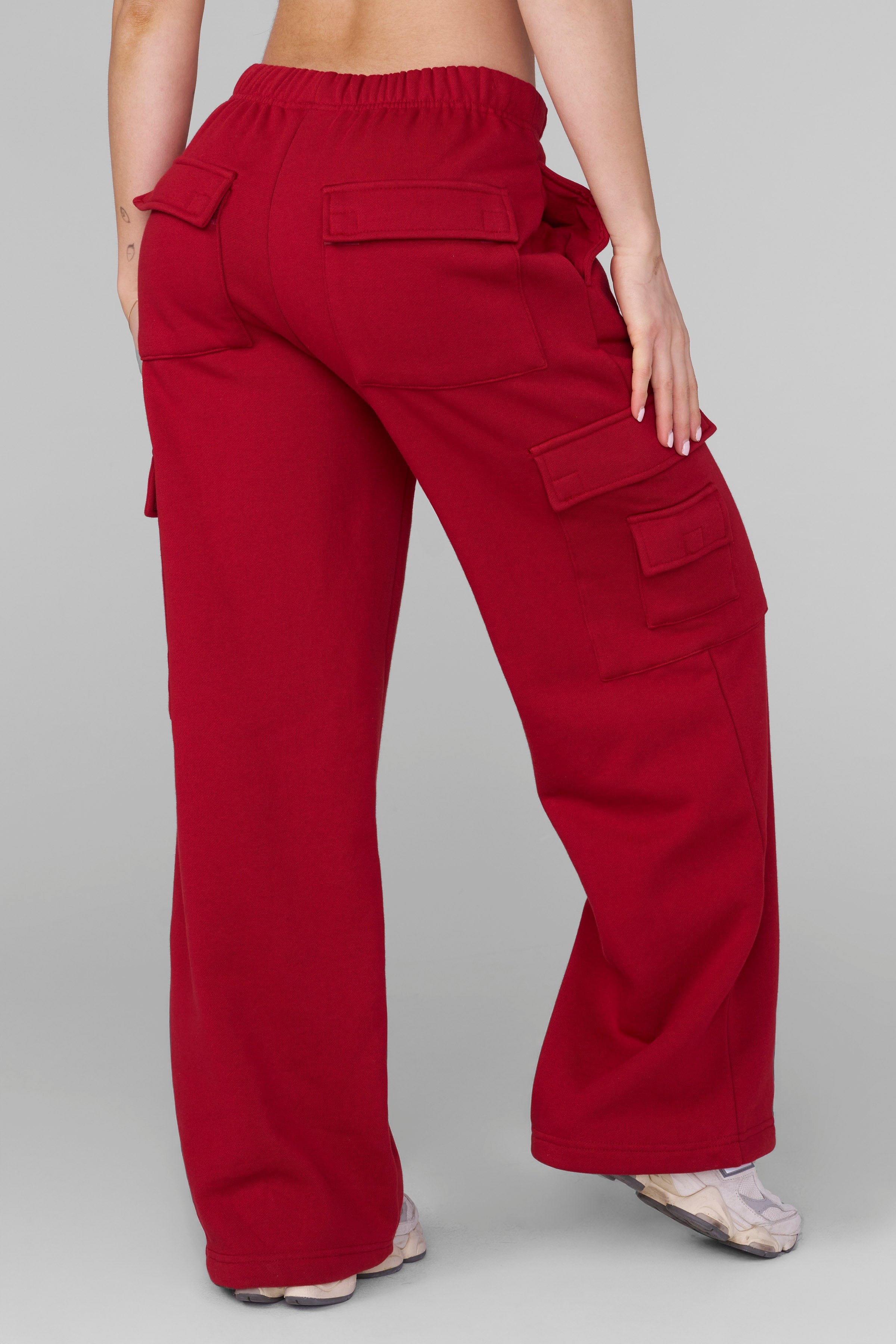 Side angle showing the relaxed silhouette and internal drawstring of mens cargo joggers