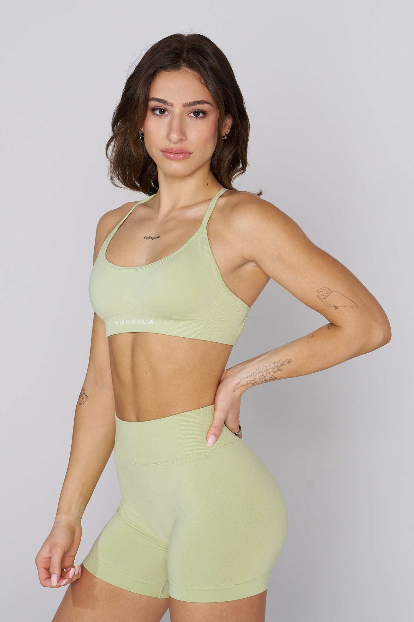 Front view of seamless bra in coral spring shade, highlighting breathable fabric
