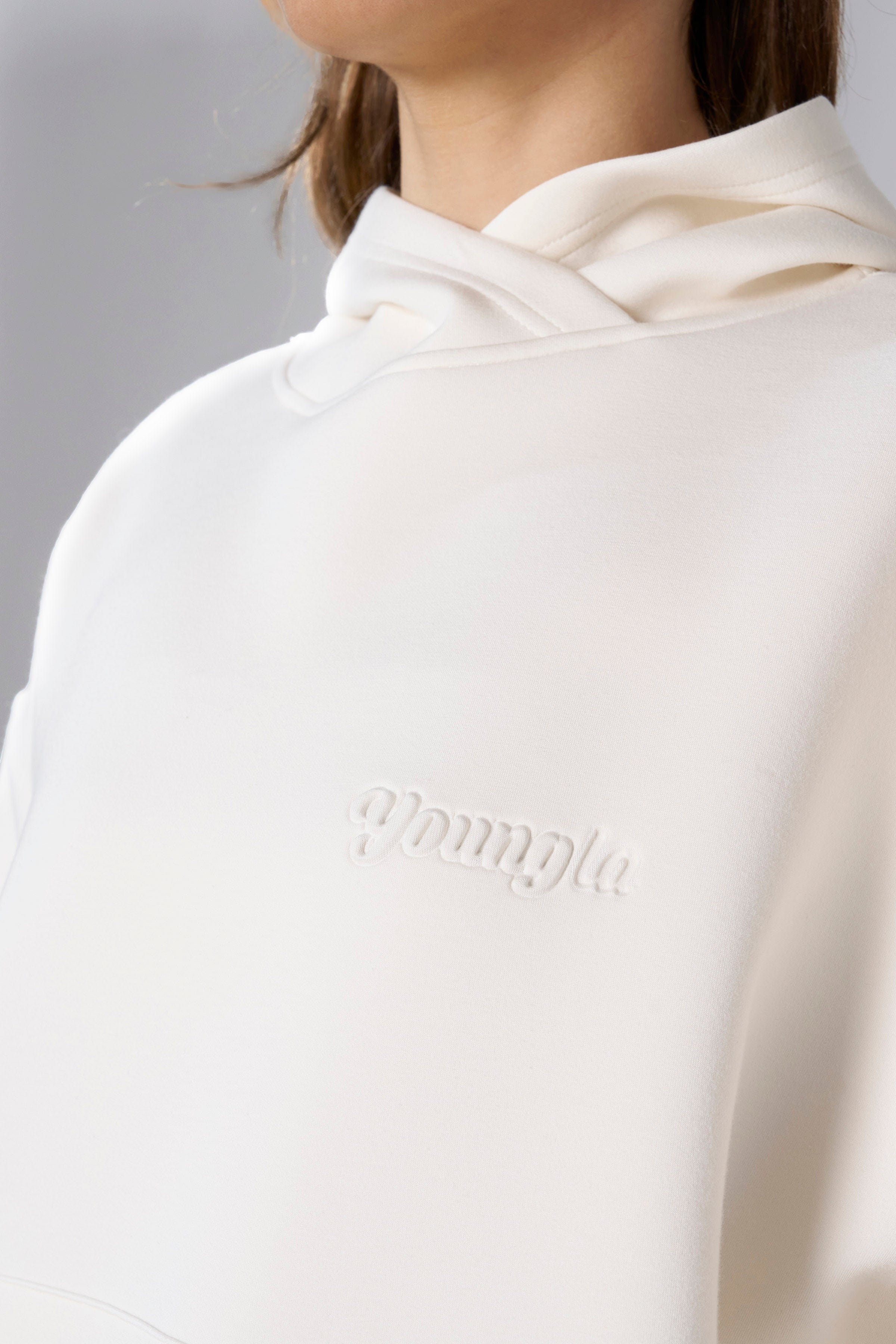 Model wearing the mens Carhartt hoodie, perfect for casual outings.