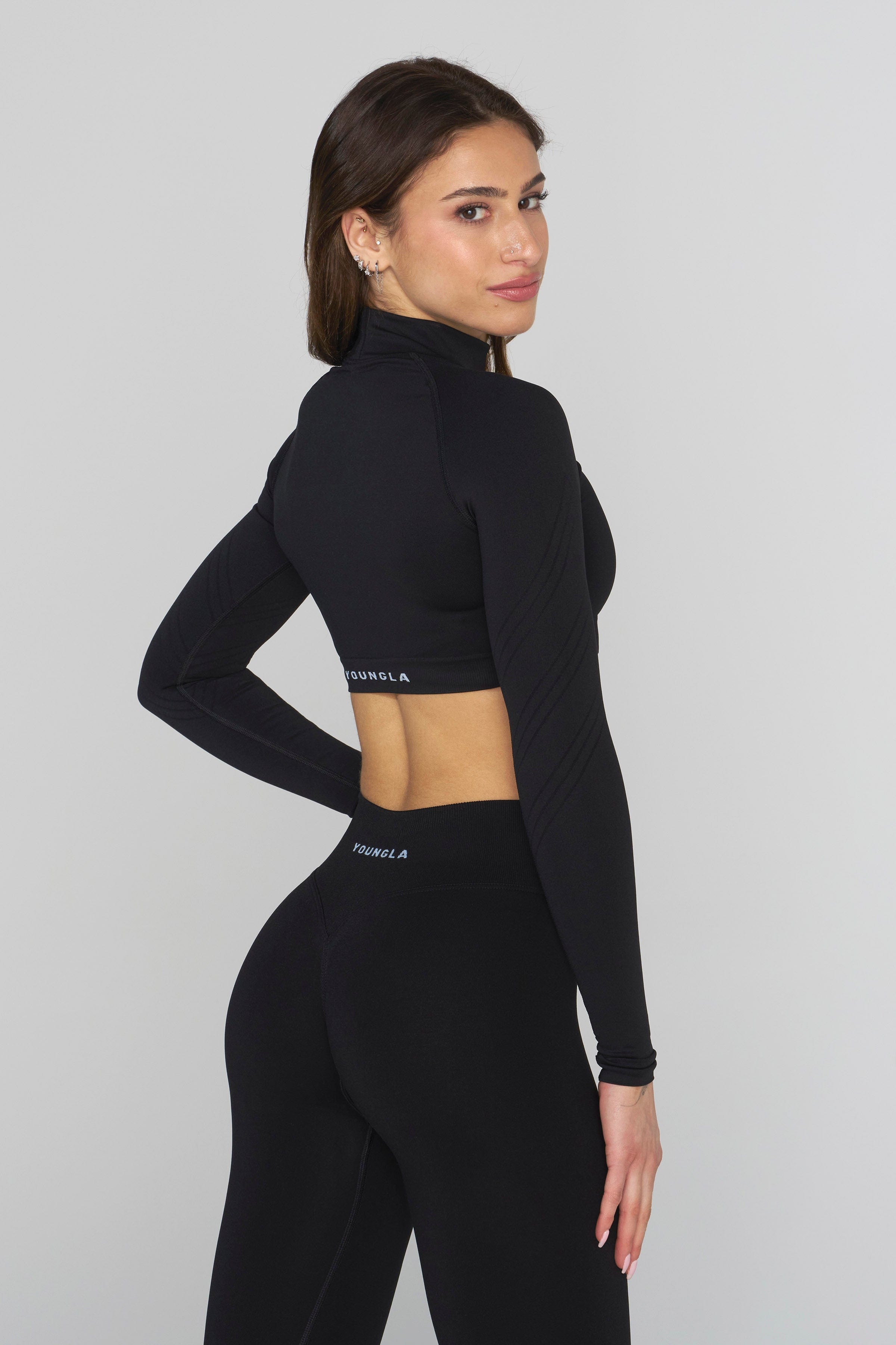 Back view of crop top showcasing breathable fabric texture.