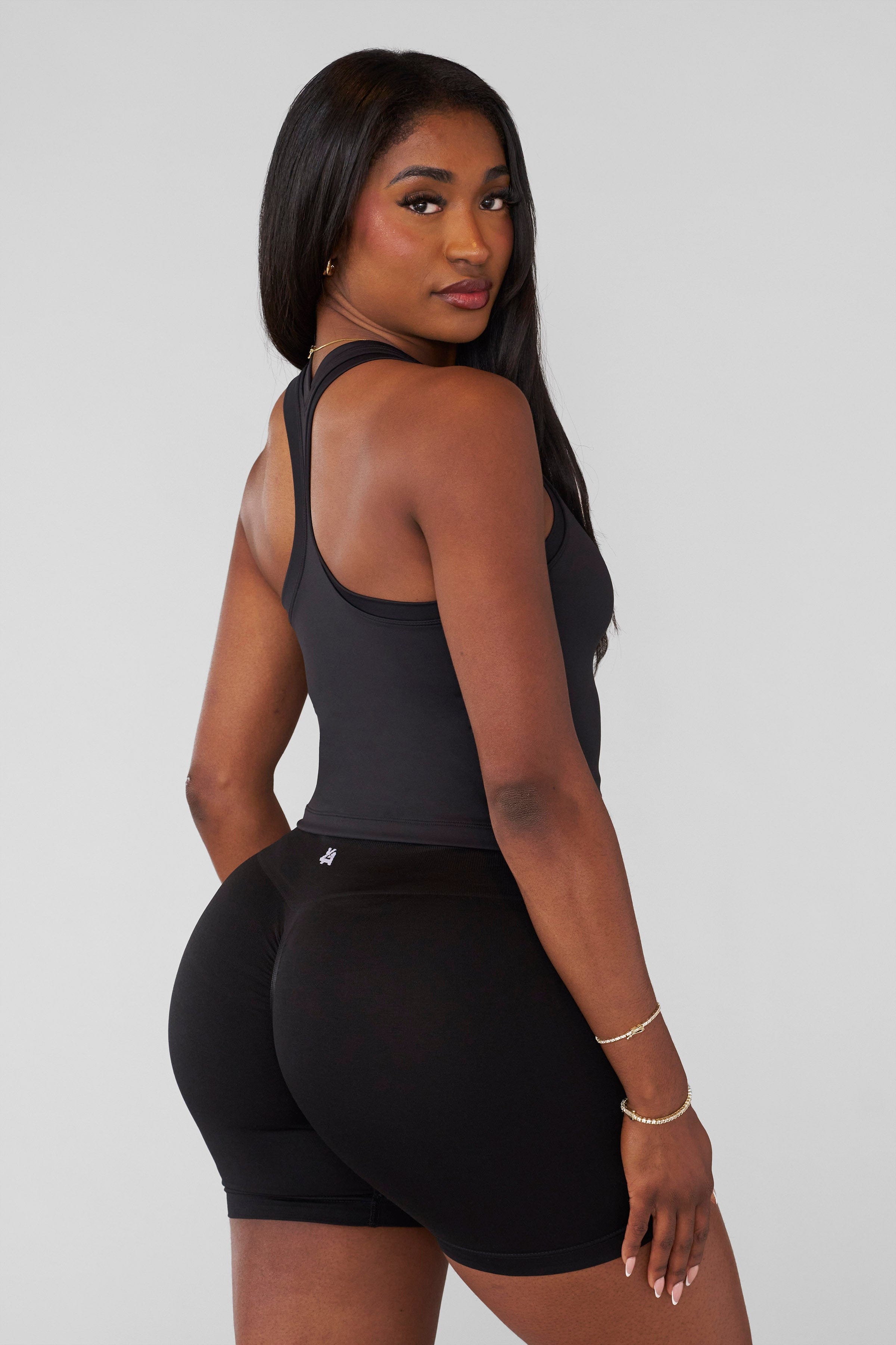Front view of the Core Luxe Performance Tank for Women during a workout.