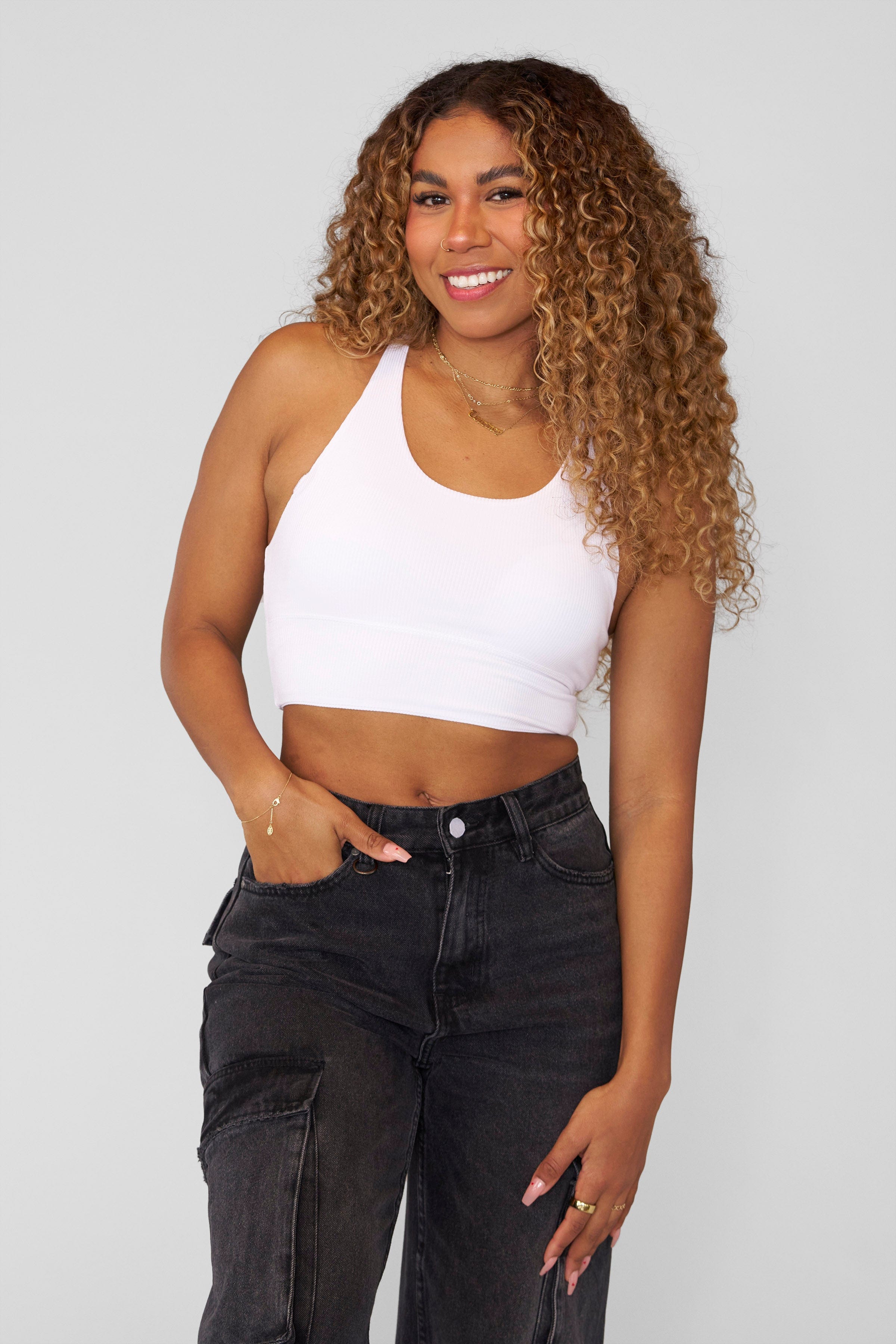 Side view of the womens ribbed tank top, highlighting its racerback design.