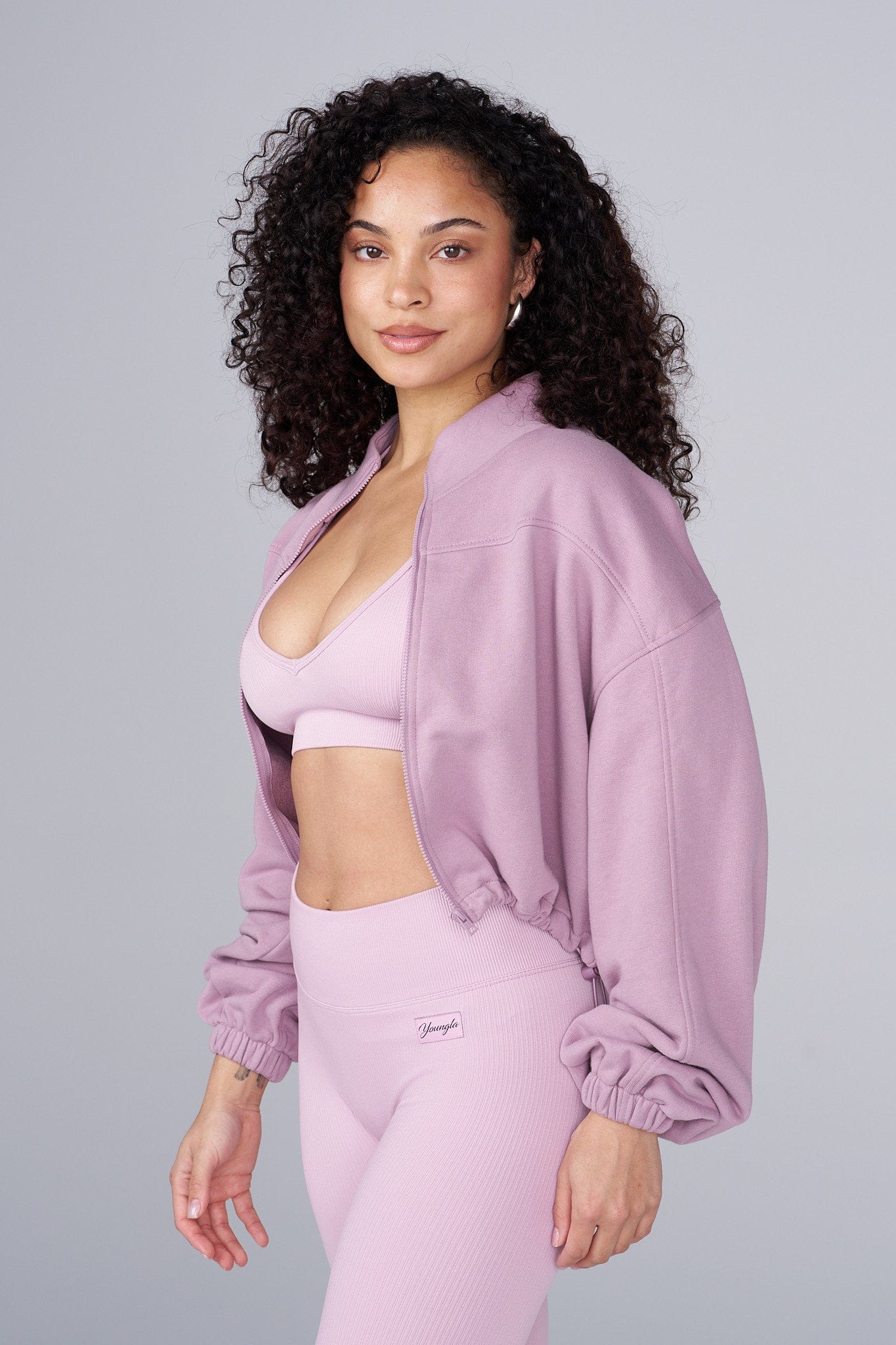 Front view of the Breeze Zip-Up, styled effortlessly for daily wear