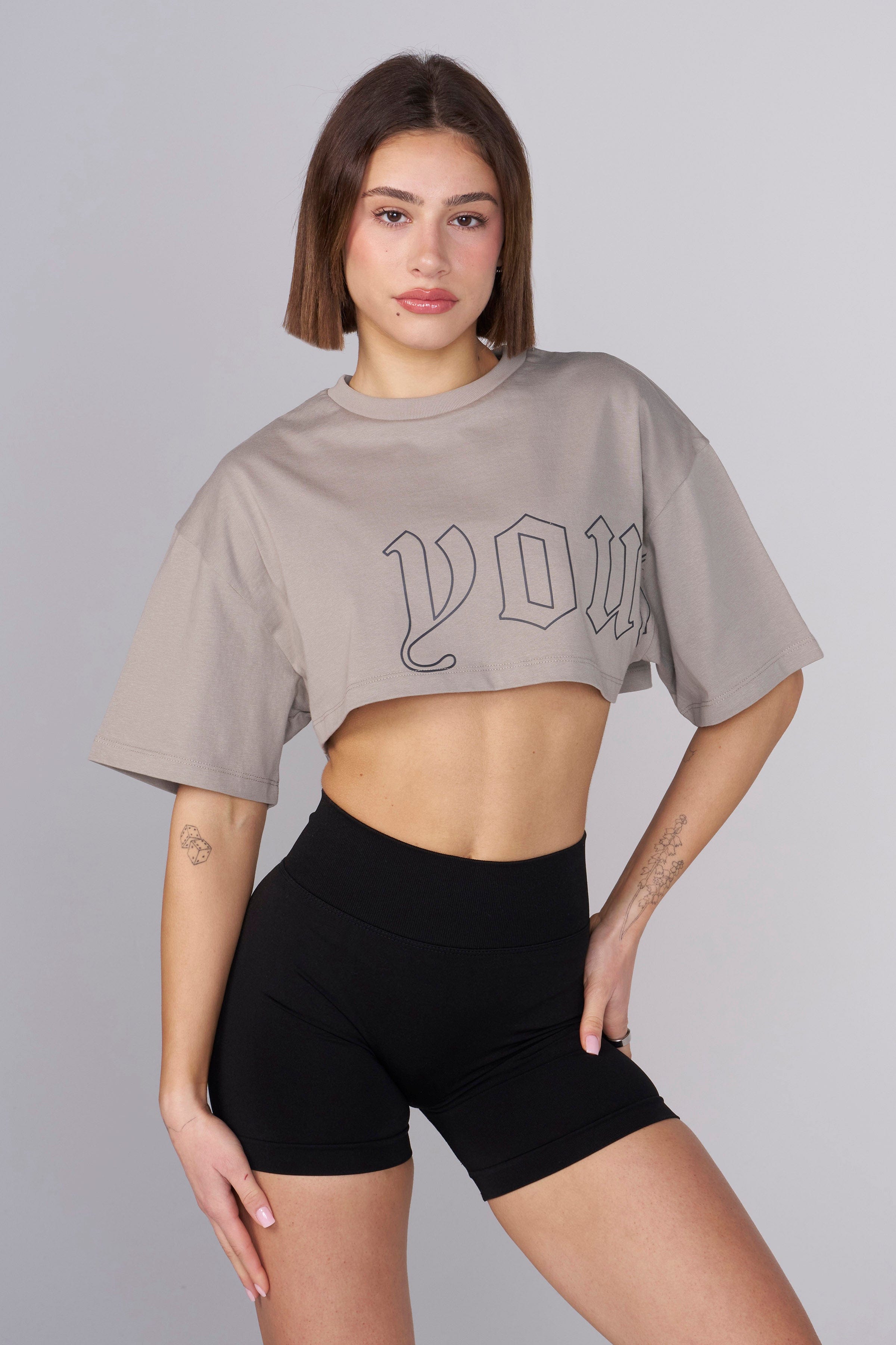 Front view of the Urban Vibe Boxy Cropped Tee in a casual setting.