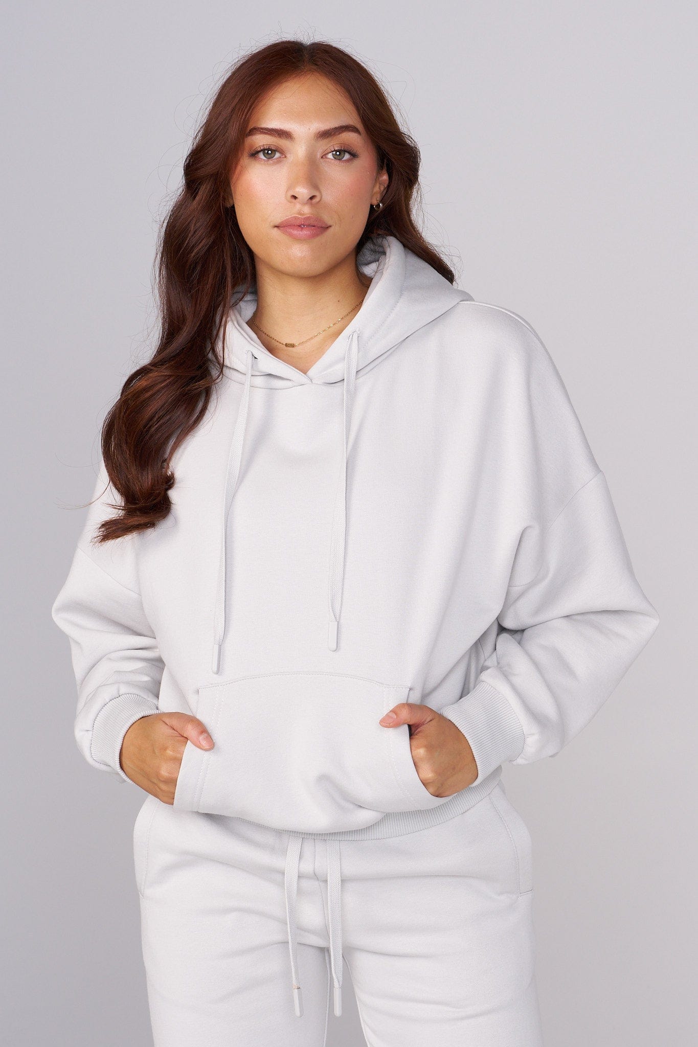 Close-up of the embroidered detail on the oversized hoodie.