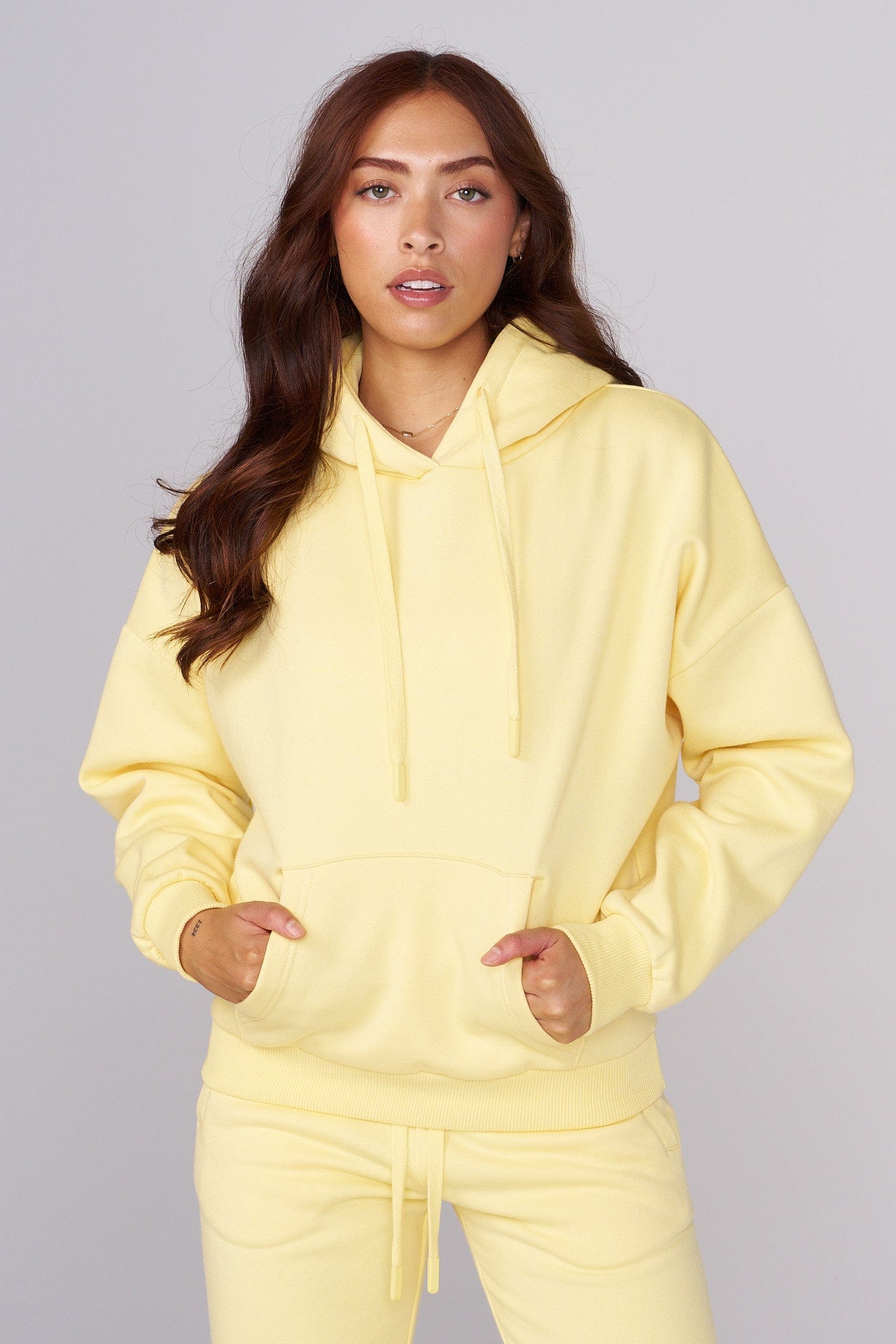 Front view of the oversized hoodie showcasing its embroidered design.
