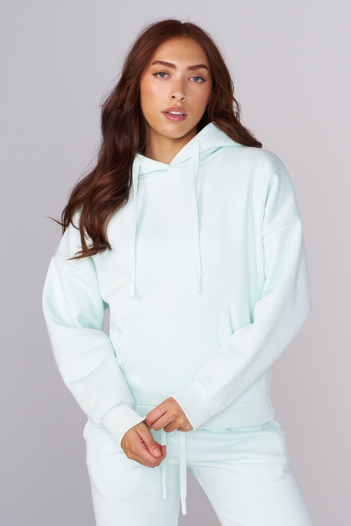 Front view of the oversized hoodie showcasing its embroidered design.