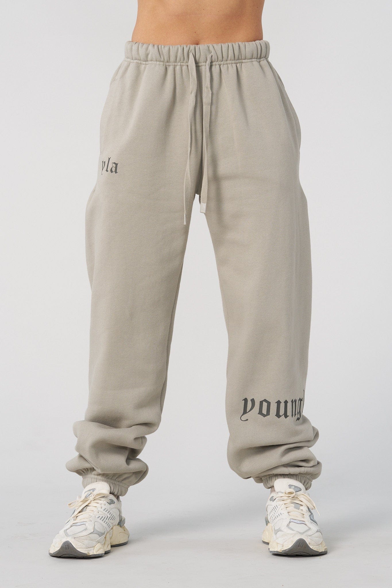 Close-up of urban cuff joggers with cuffed ankles and fleece fabric detail