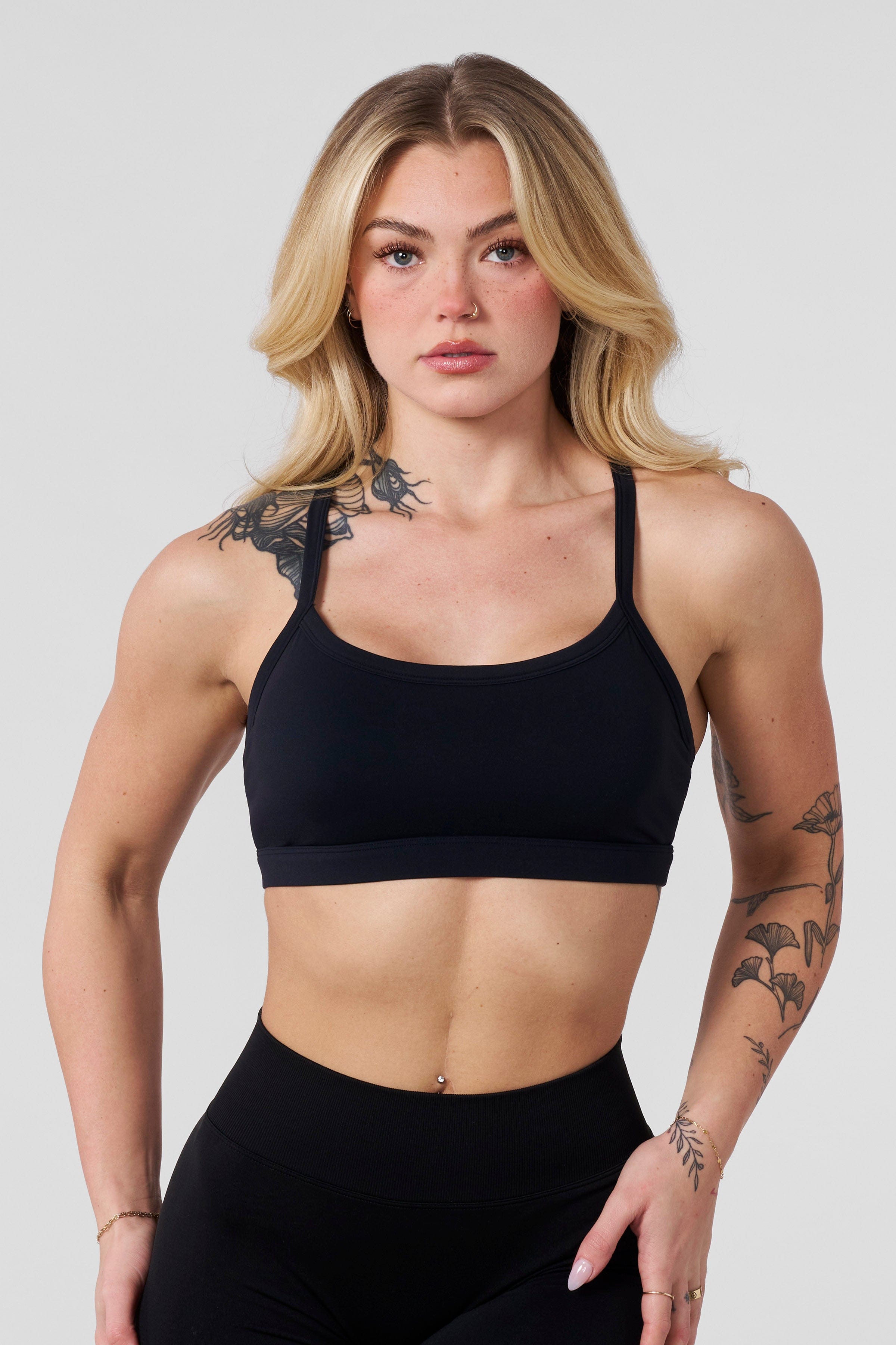 Back view showing breathable racerback feature of high impact sports bra during yoga