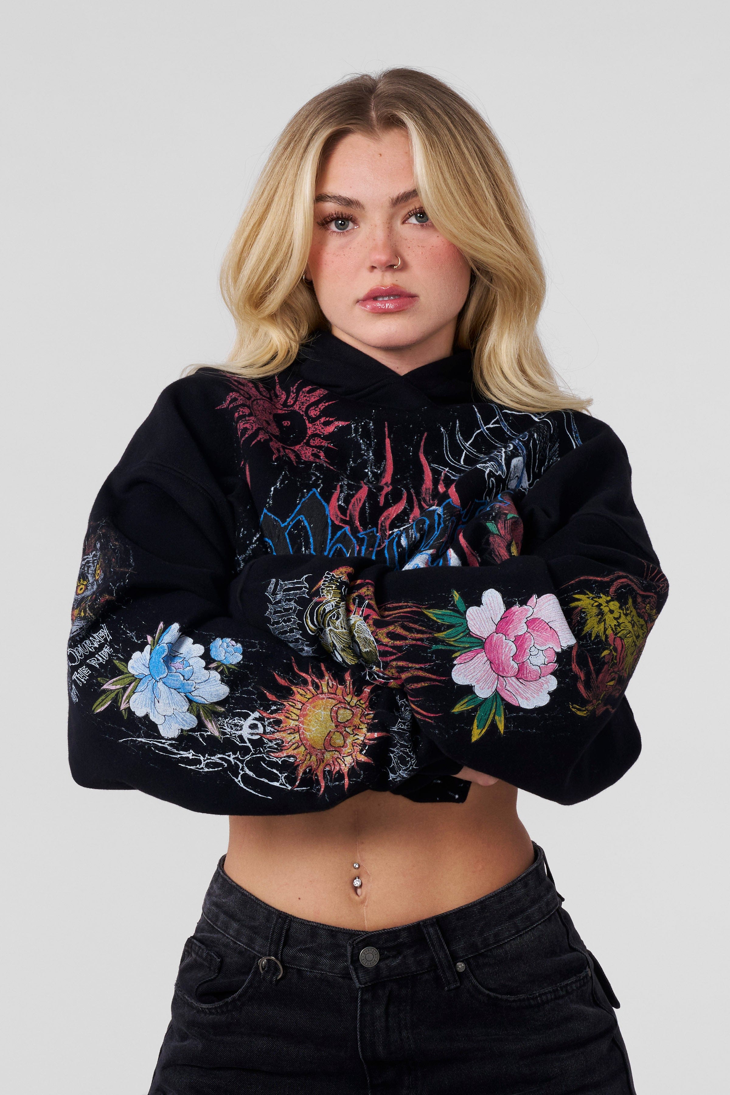 Front view of oversized hoodie in flame-red with streetwear-style ink illustration