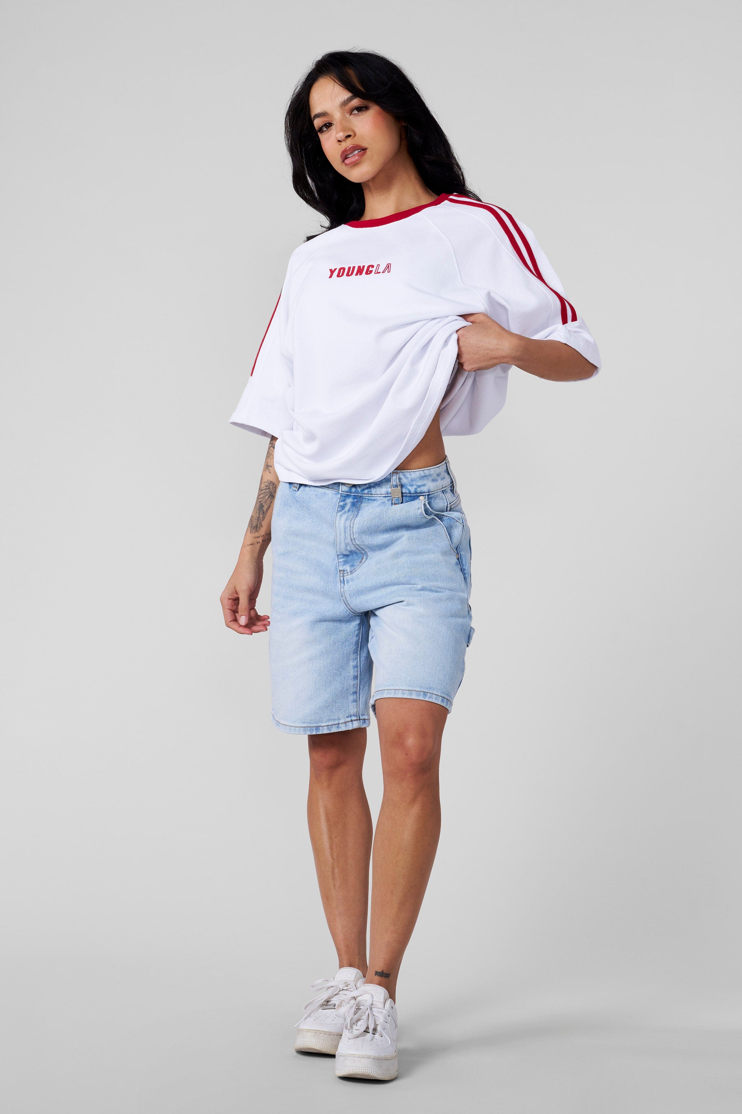 Casual street-style outfit featuring this oversized t-shirt with jeans