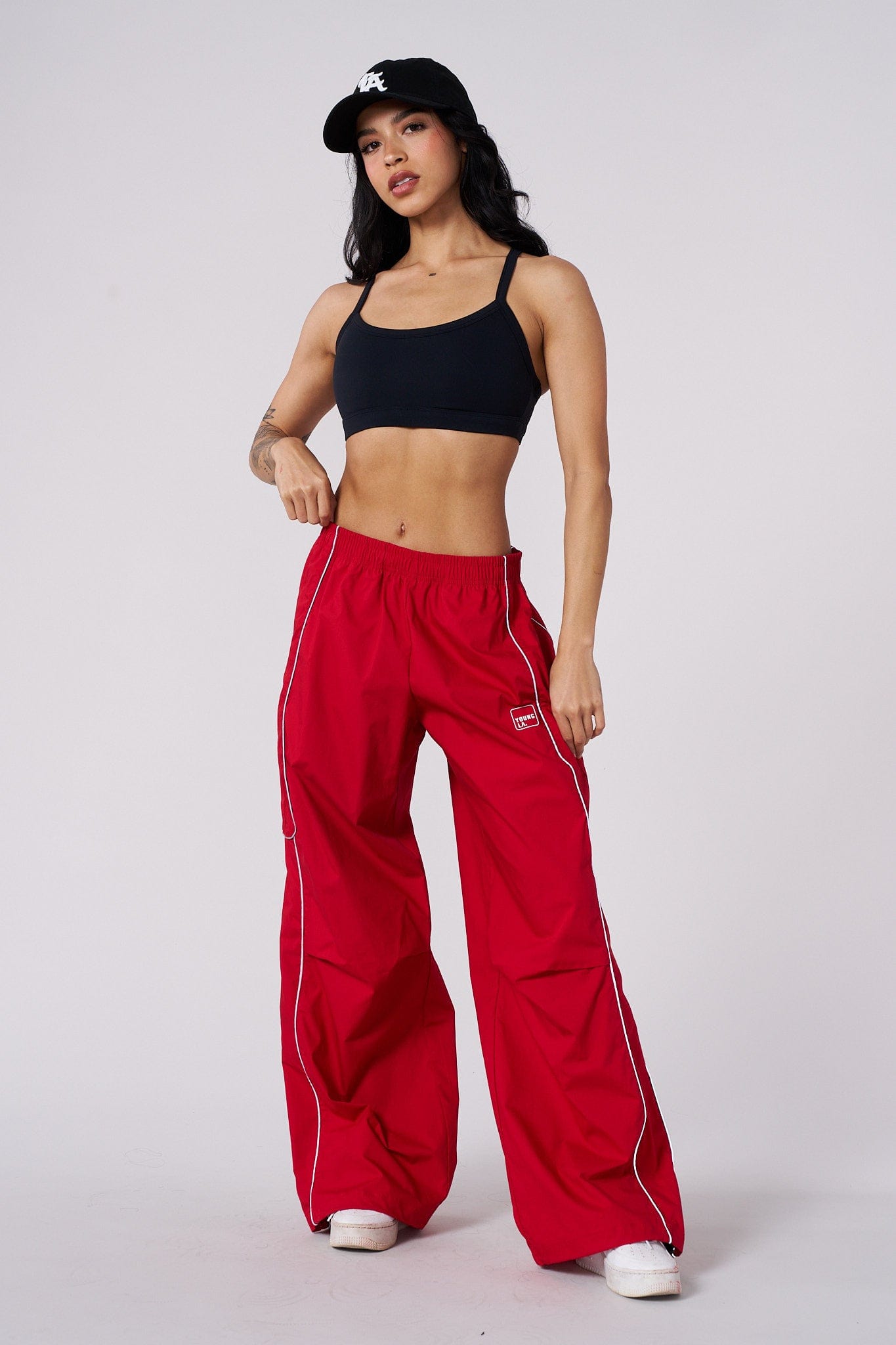 Side view of cotton track pants for women with reflective details for evening walks
