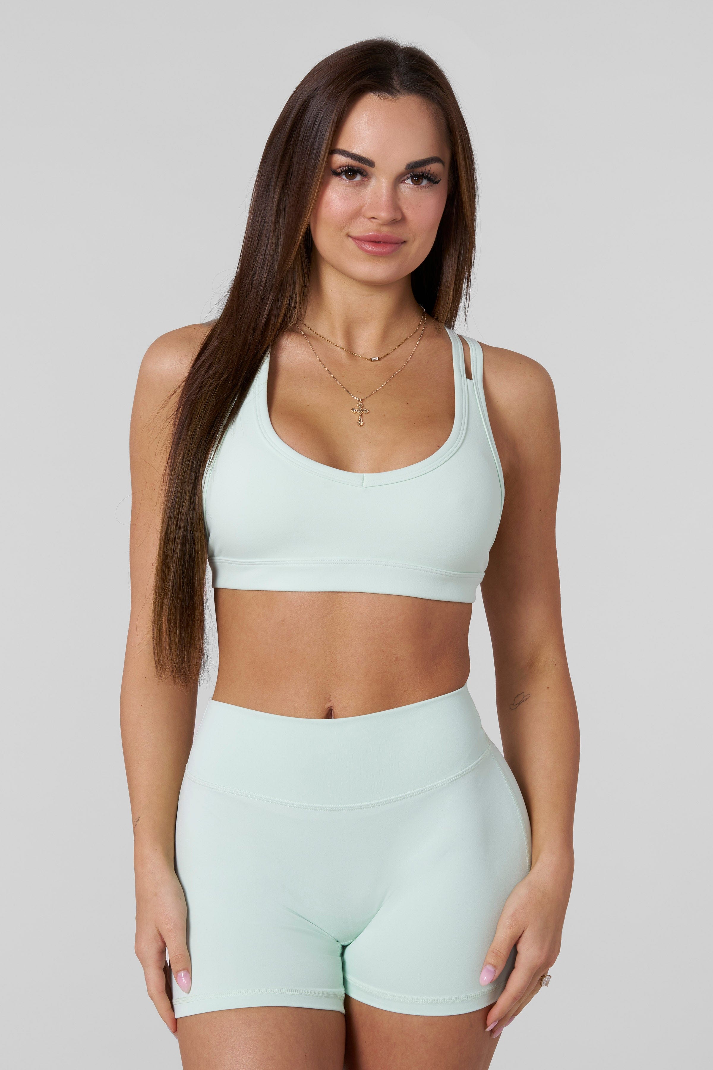 Front view of the Effortless Sports Bra showcasing its double cross back design.