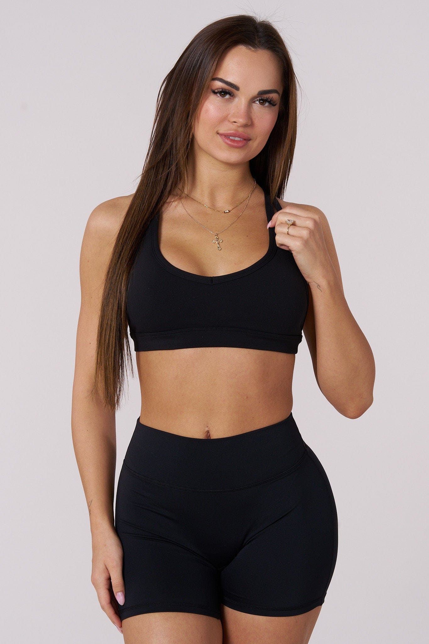Close-up of the reflective YoungLA logo on the back of the sports bra.