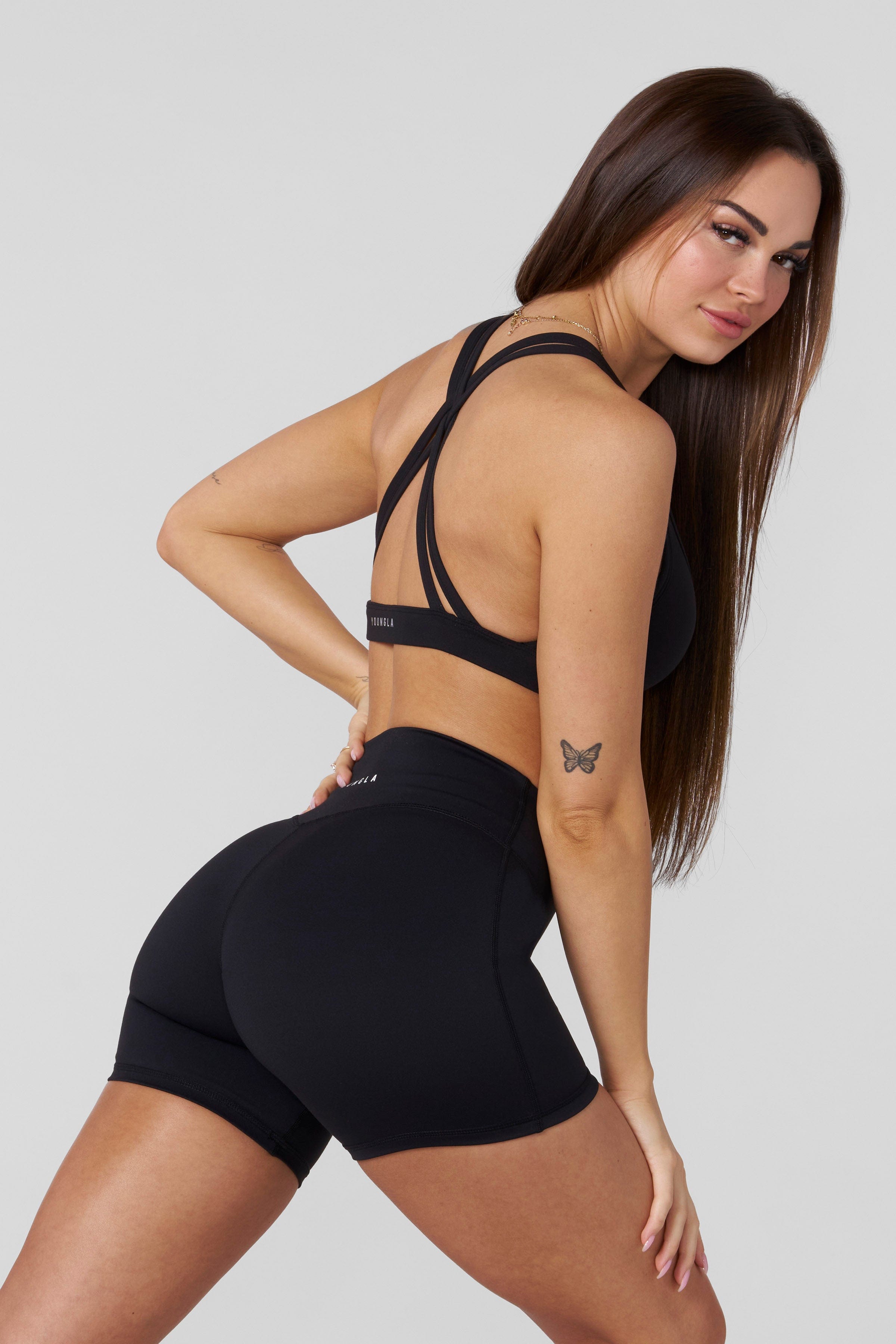 Back view showing V-seam design of womens workout shorts