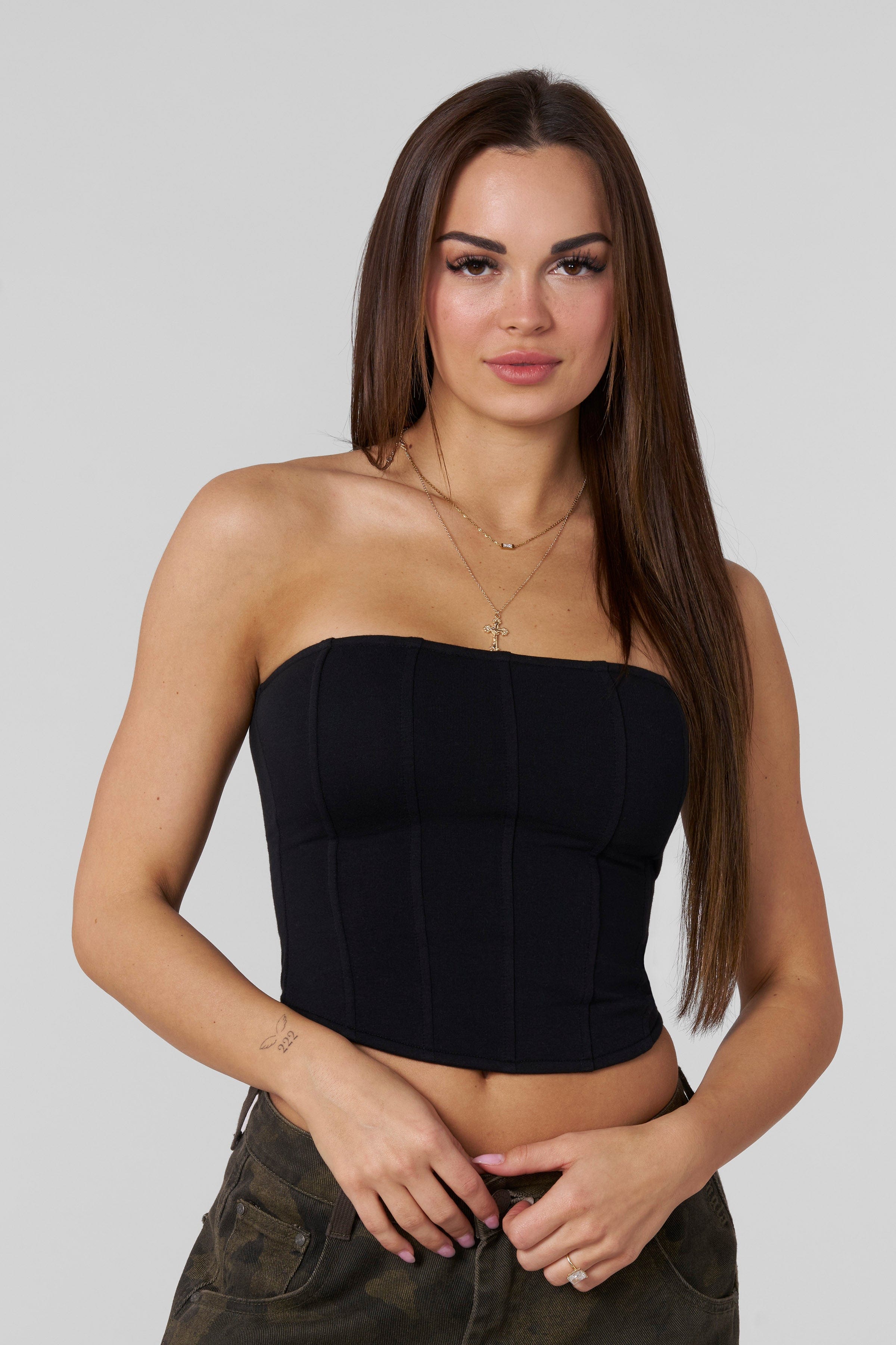 Close-up of sculpt corset fabric texture and zipper seam.