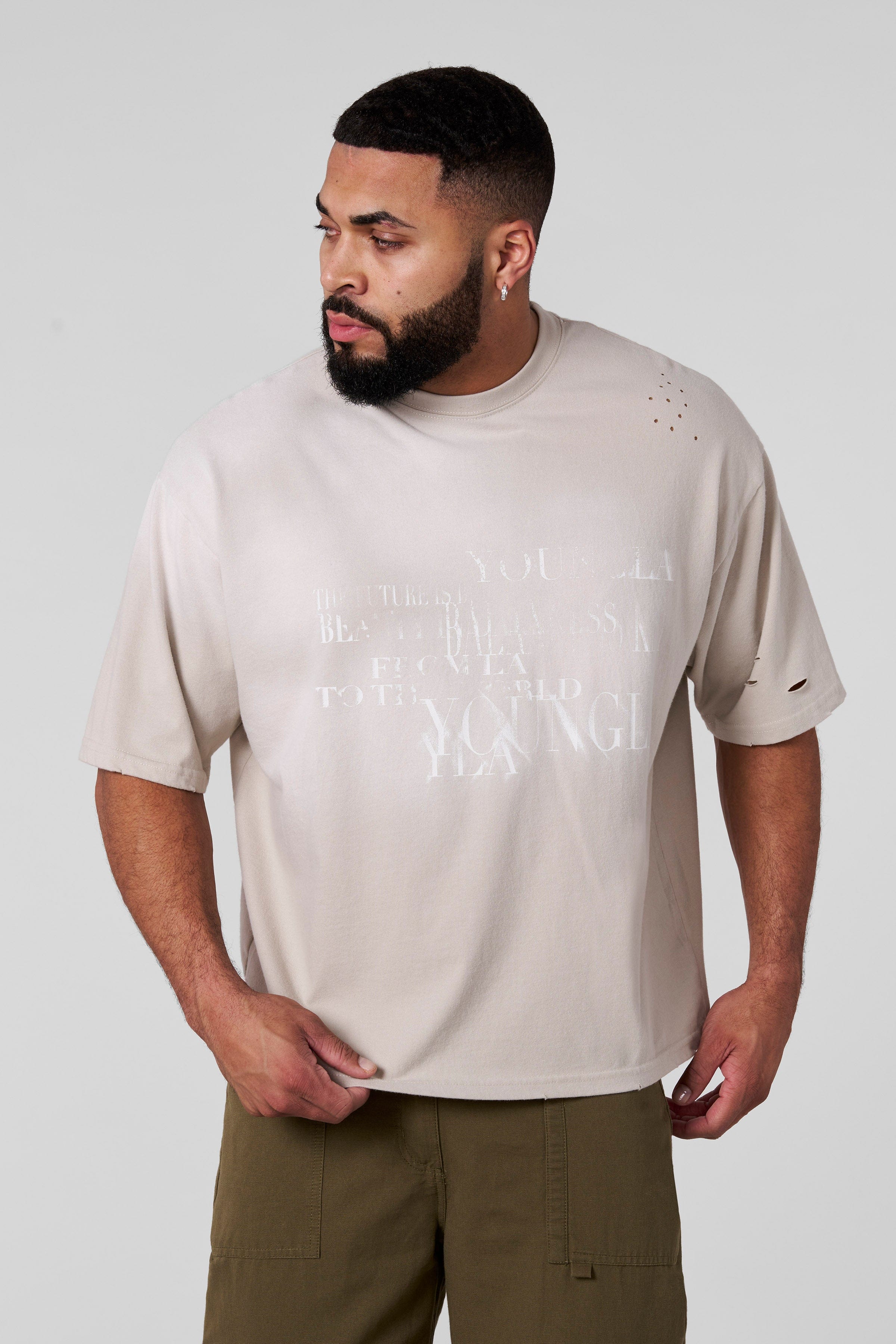 Back view showing full oversized t-shirt design with dropped shoulders