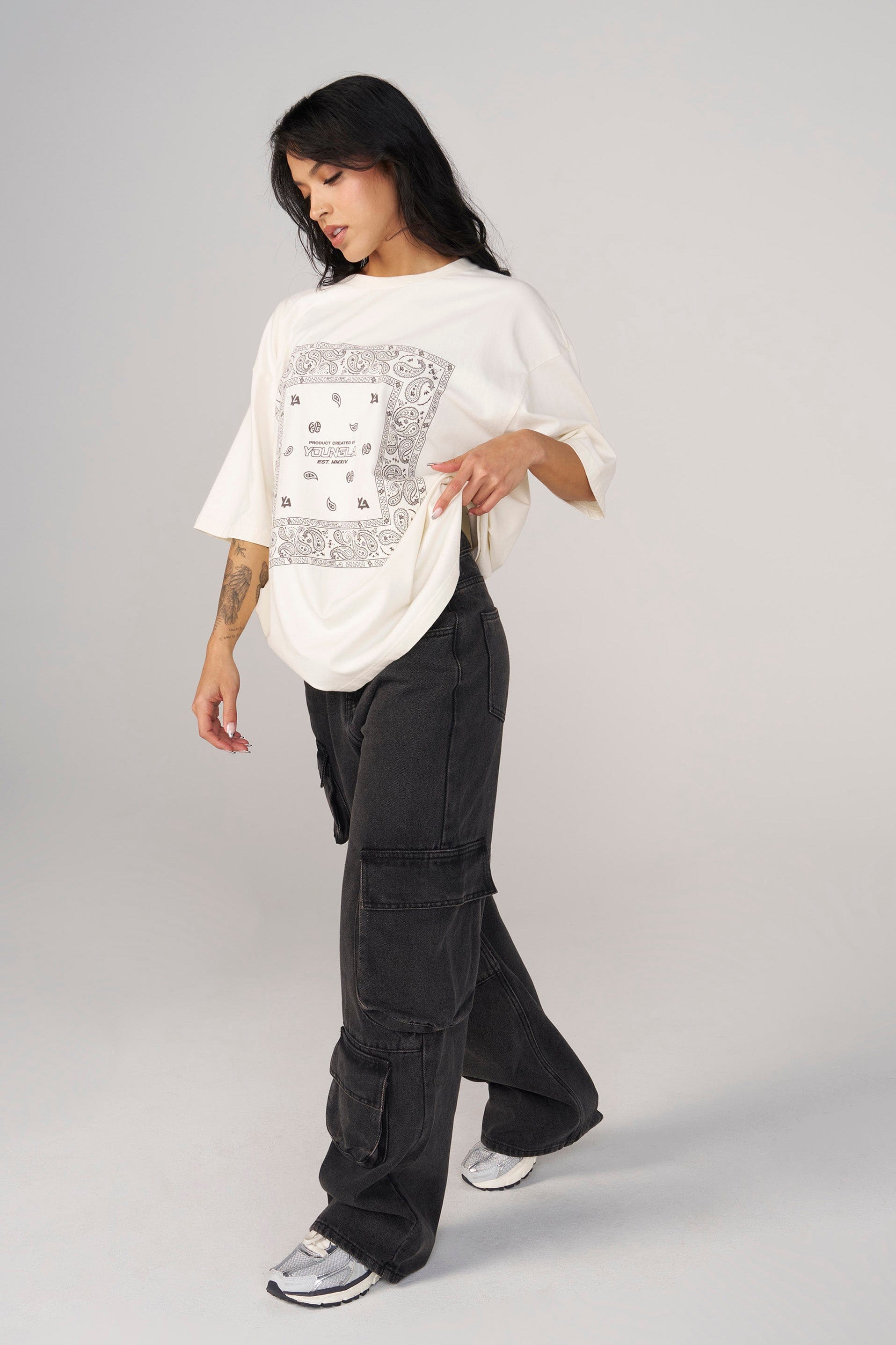 Side view showcasing the relaxed fit of the oversized t-shirt.