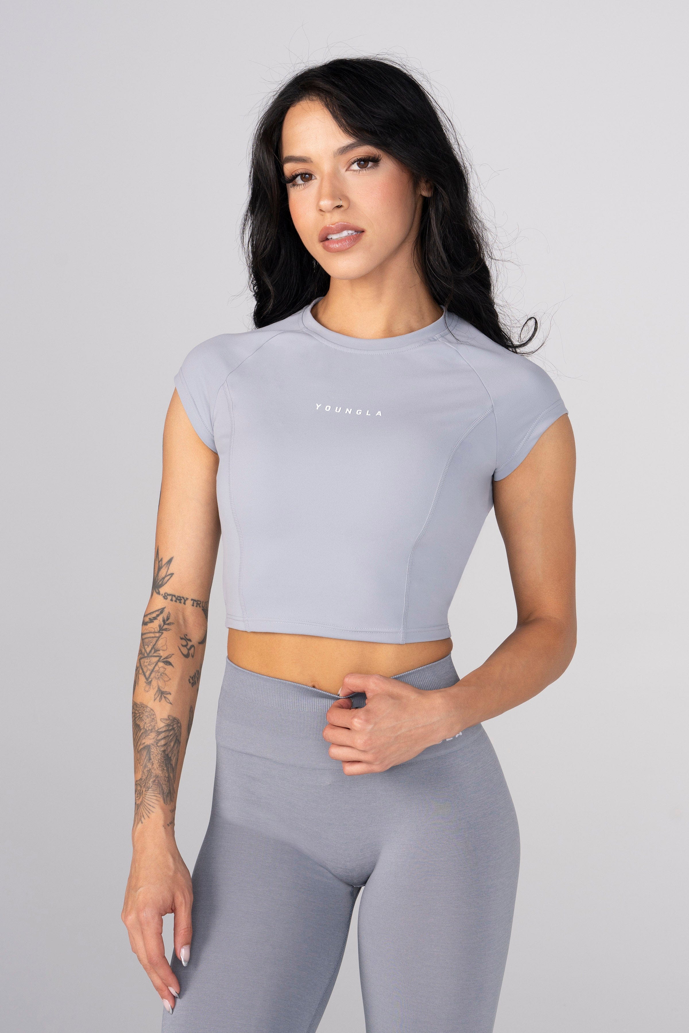 Side view showcasing the fit of the Elevate Compression Crop Top.