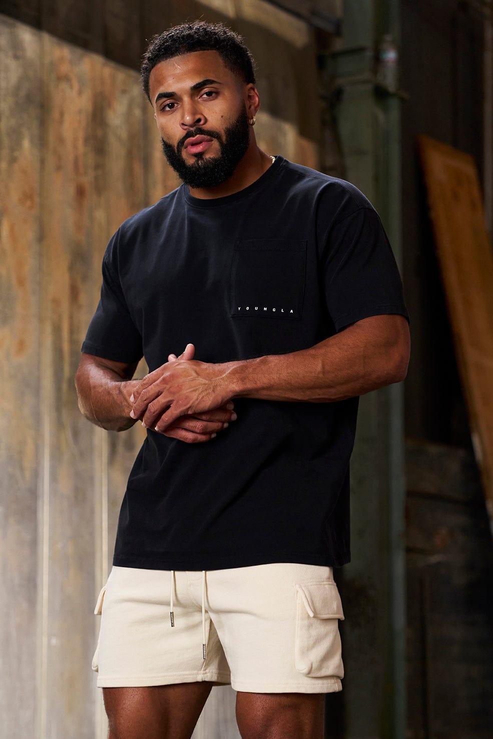Back view showing tailored tee fit around shoulders and arms