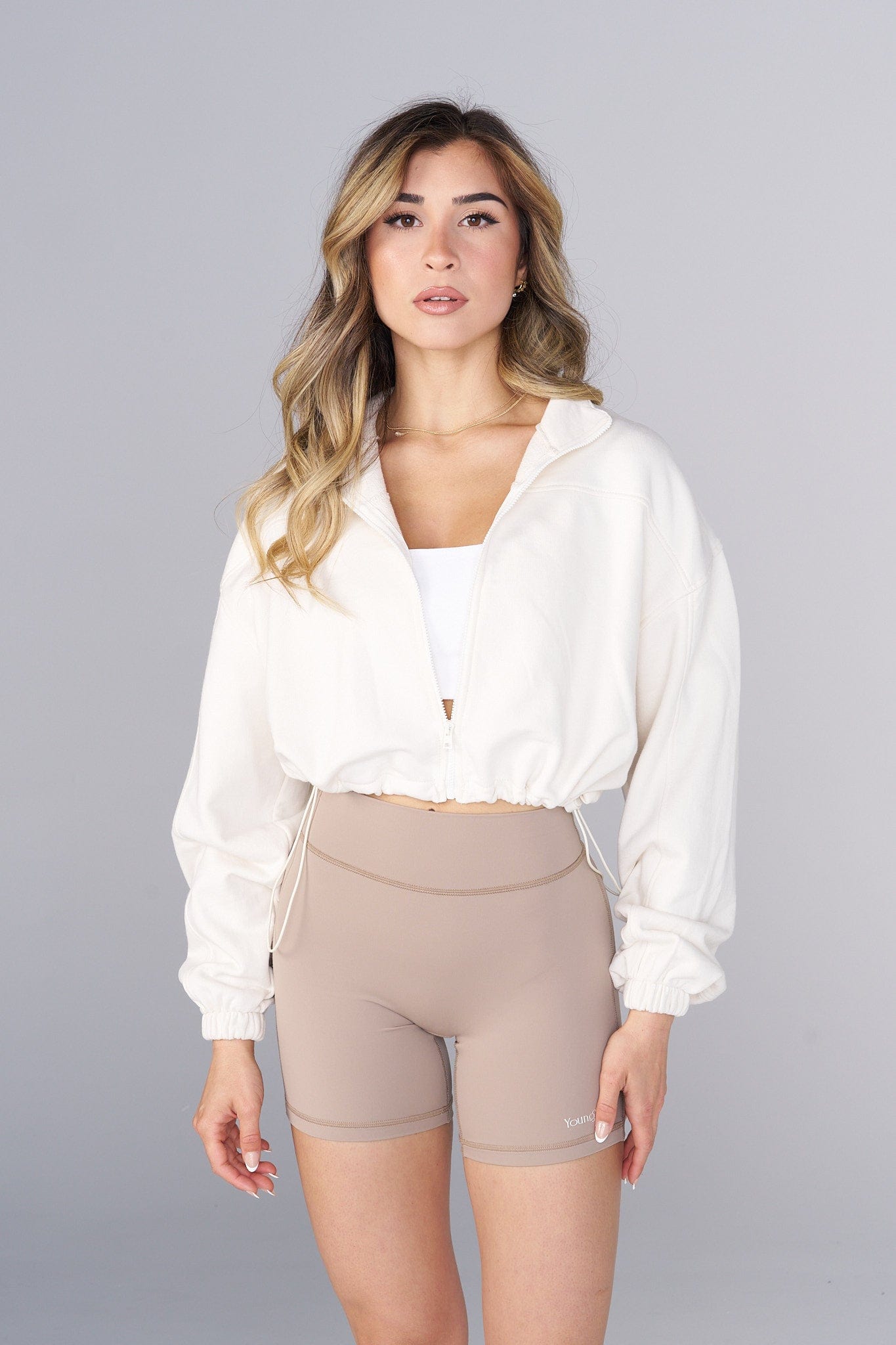 Front view of the Breeze Zip-Up, styled effortlessly for daily wear