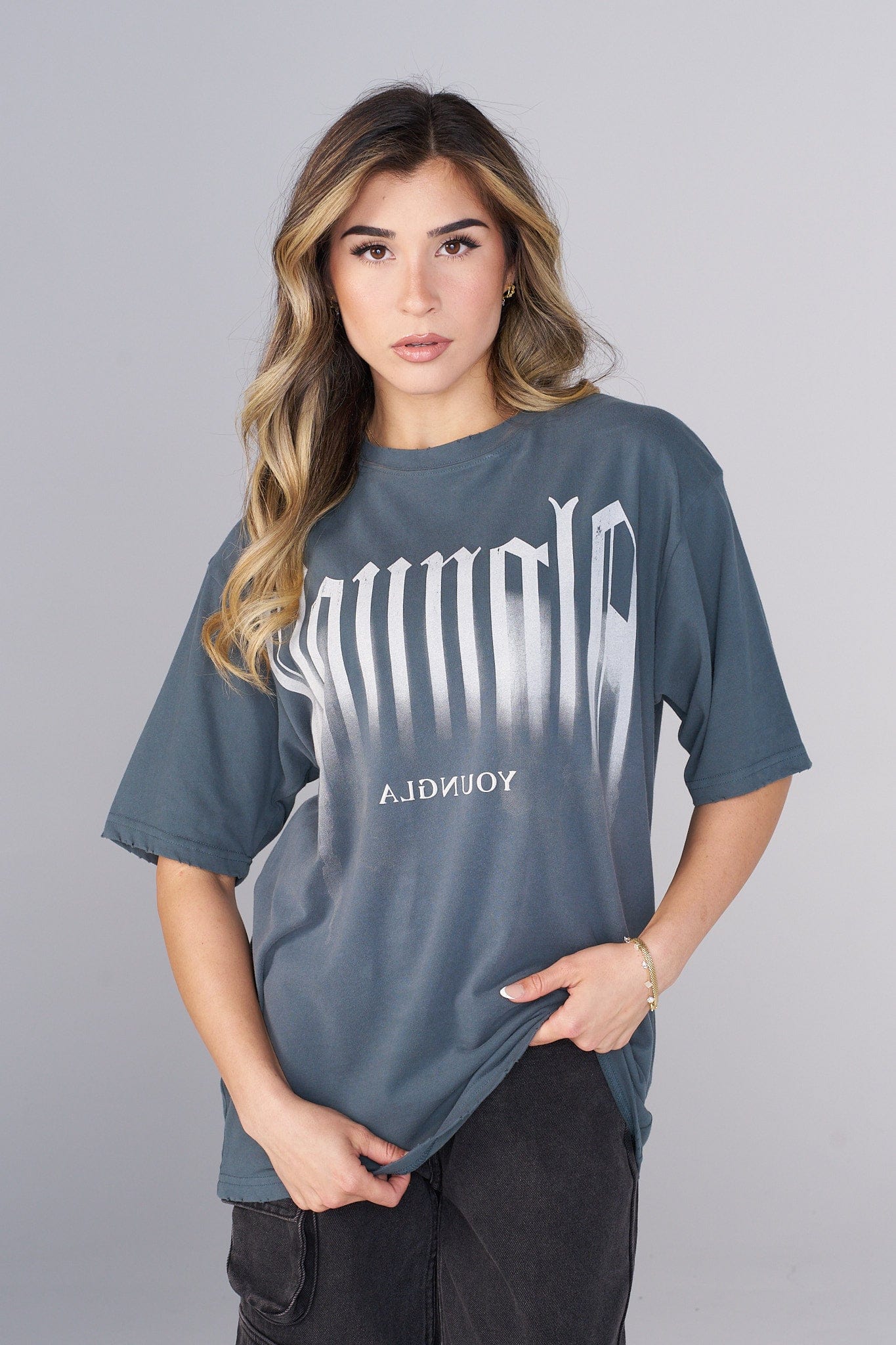 Front view of oversized smokey graphic tee with distressed edges, ideal for casual streetwear