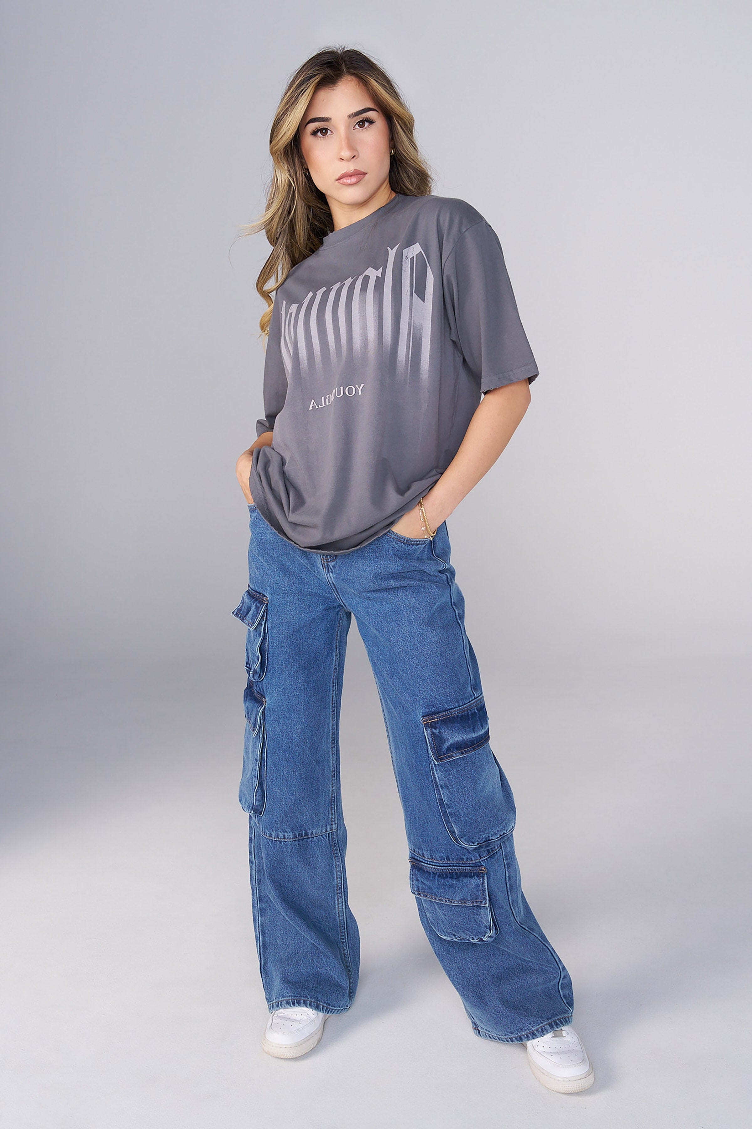 Front view of oversized smokey graphic tee with distressed edges, ideal for casual streetwear