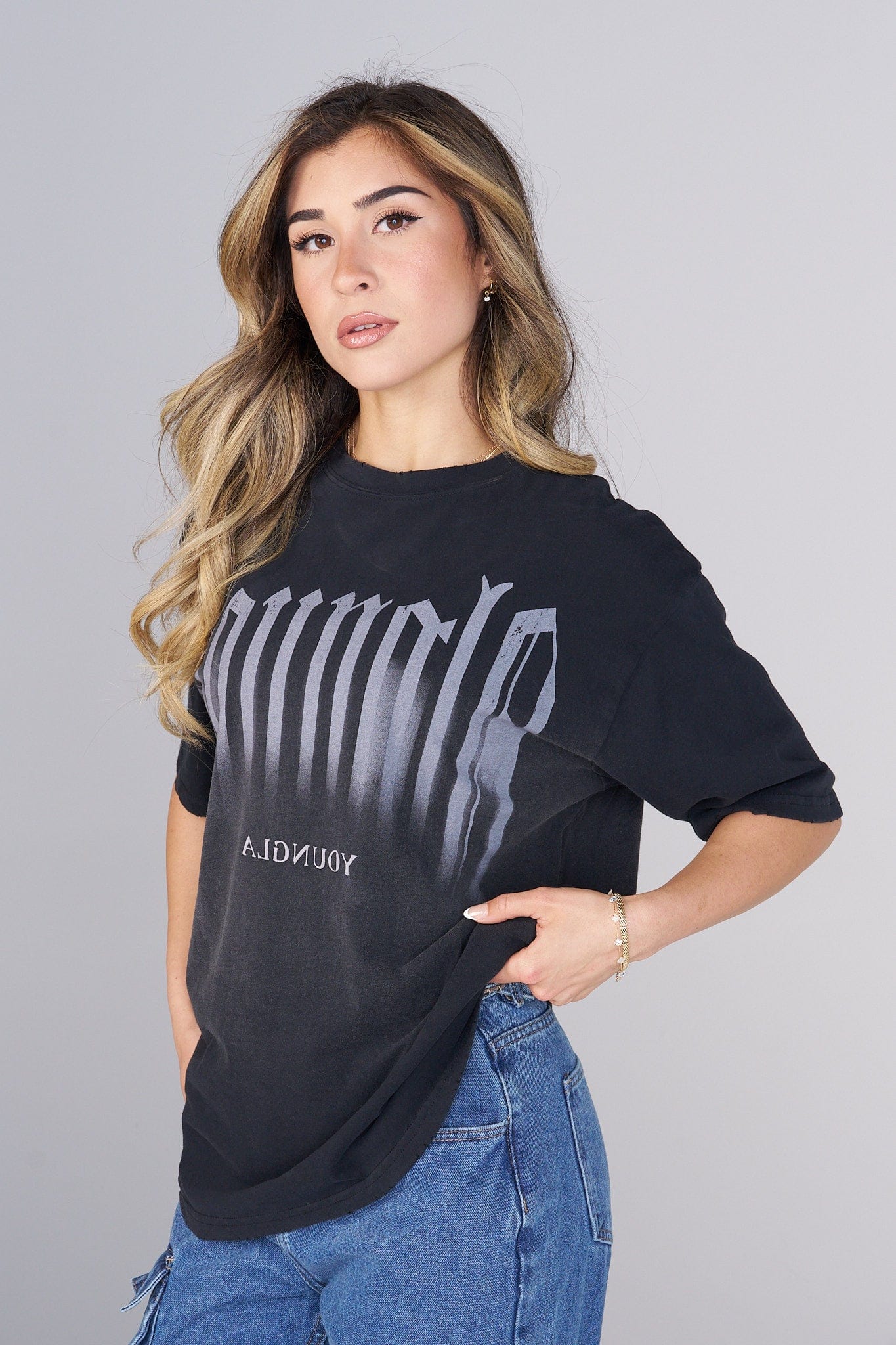 Front view of oversized smokey graphic tee with distressed edges, ideal for casual streetwear