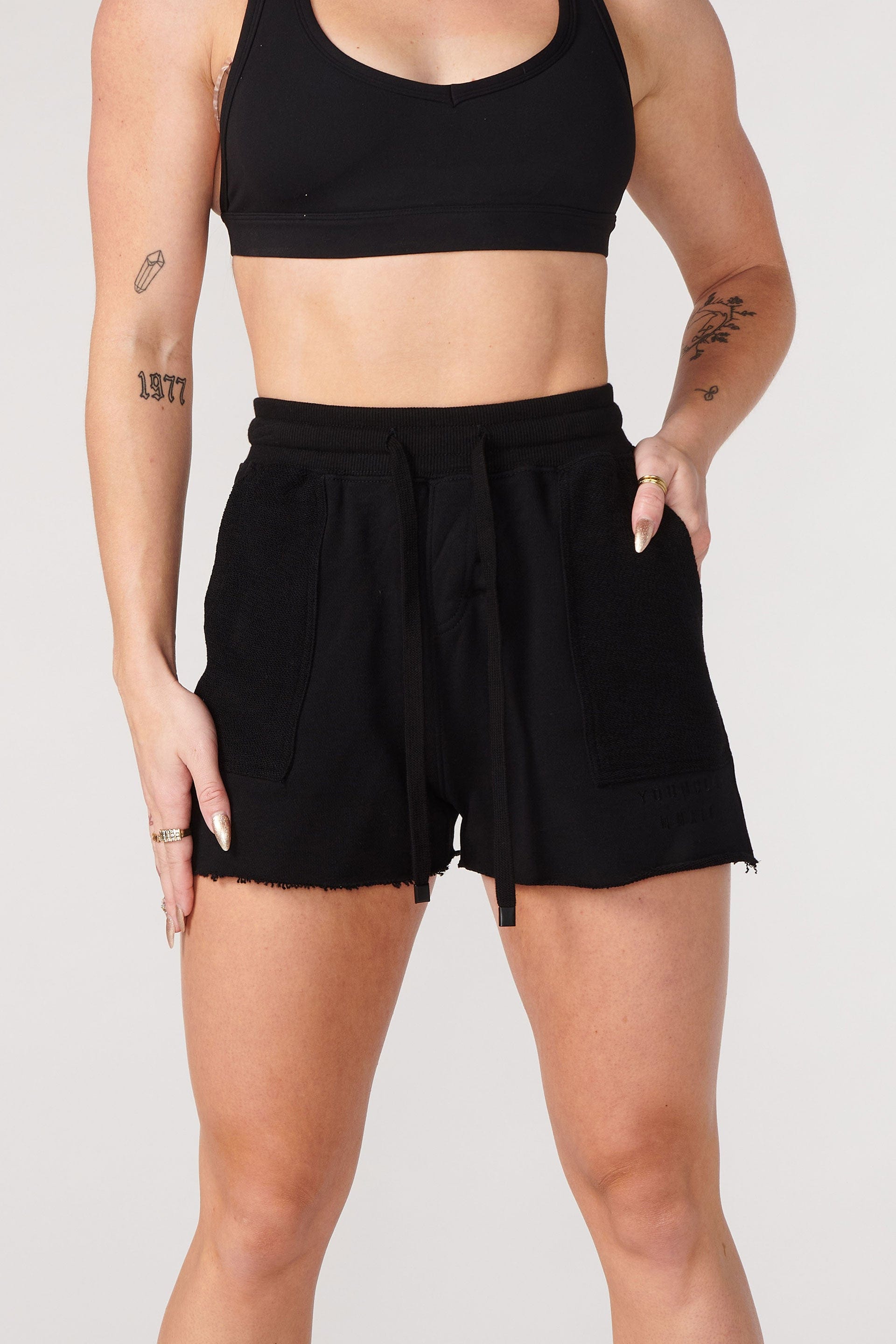 Side view of mens cotton shorts highlighting the terry texture.
