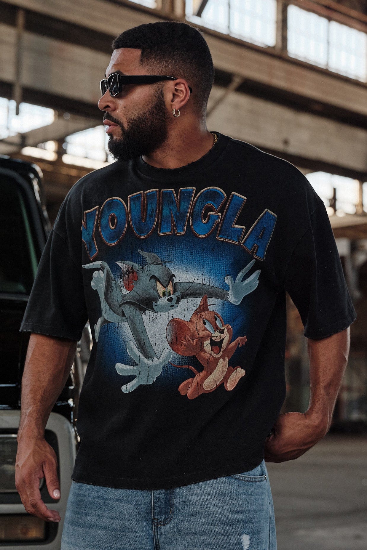 Close-up of the soft cotton fabric and vibrant graphics on the oversized T shirt