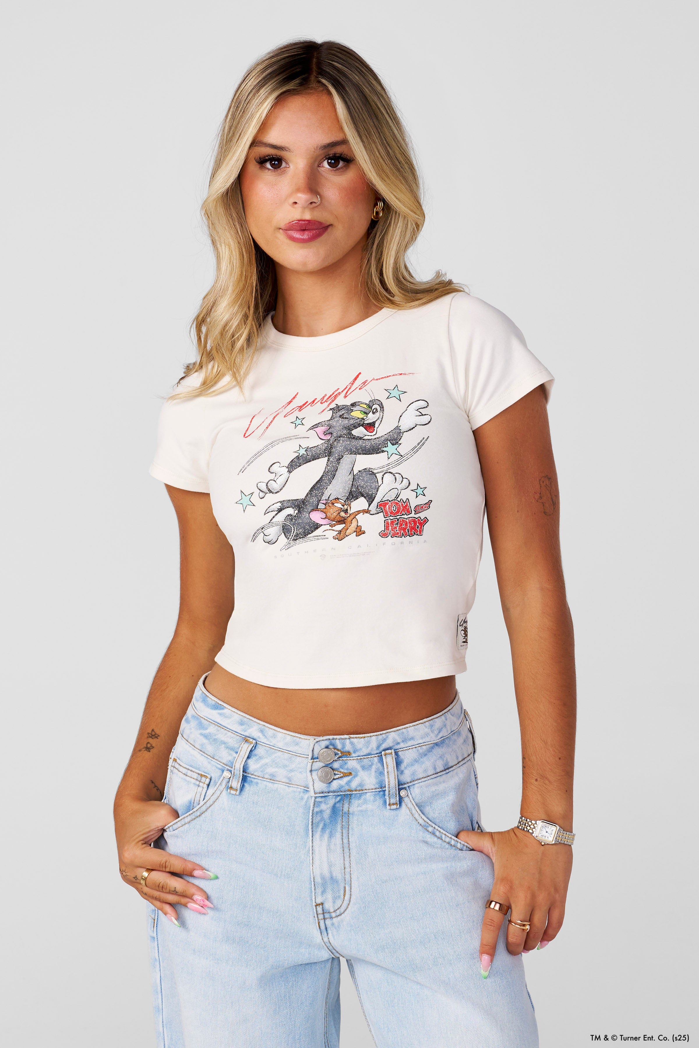 Close-up of soft fabric texture on Tom and Jerry shirt for toddlers