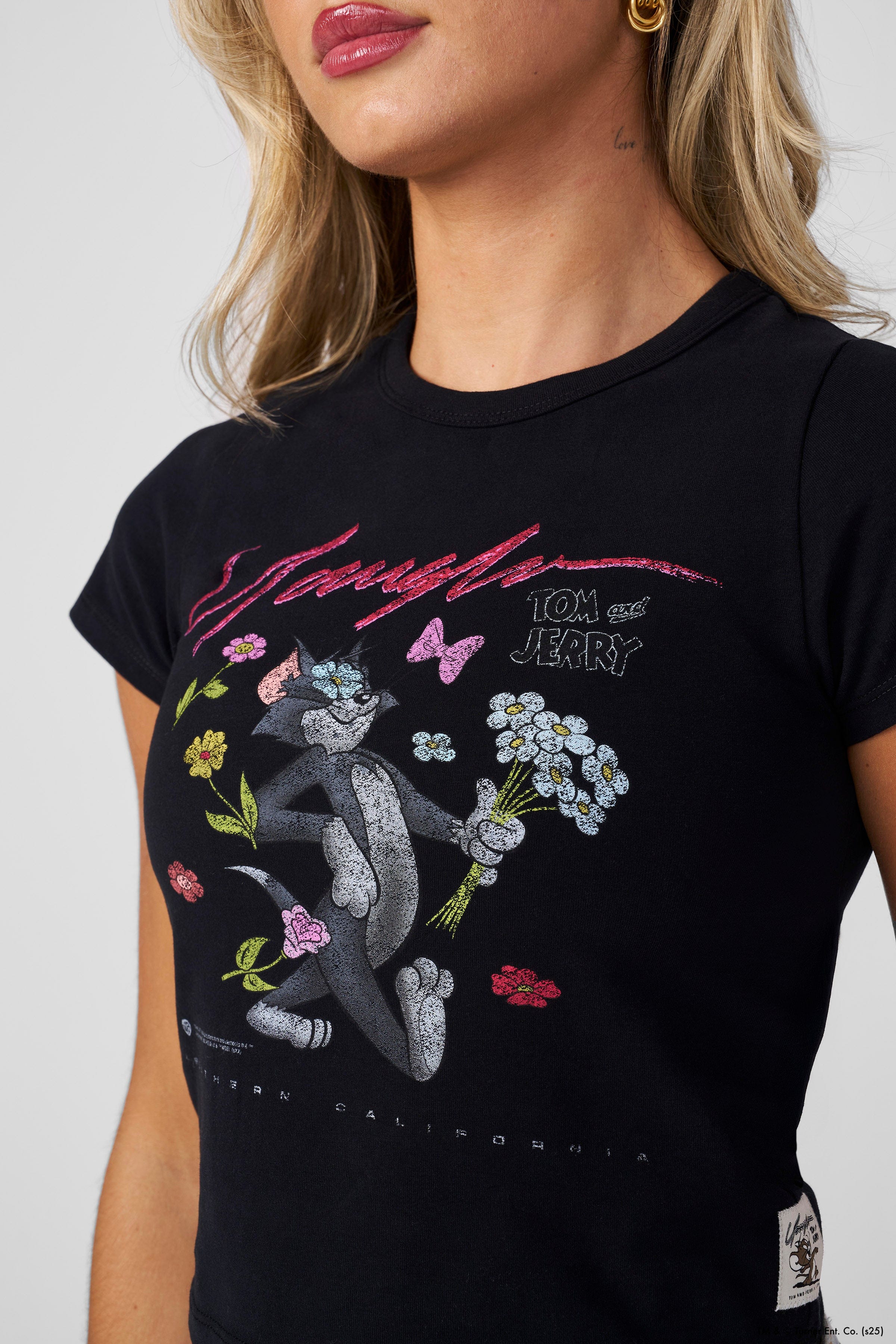 Tom and Jerry graphic baby tee in vibrant color, perfect for kids