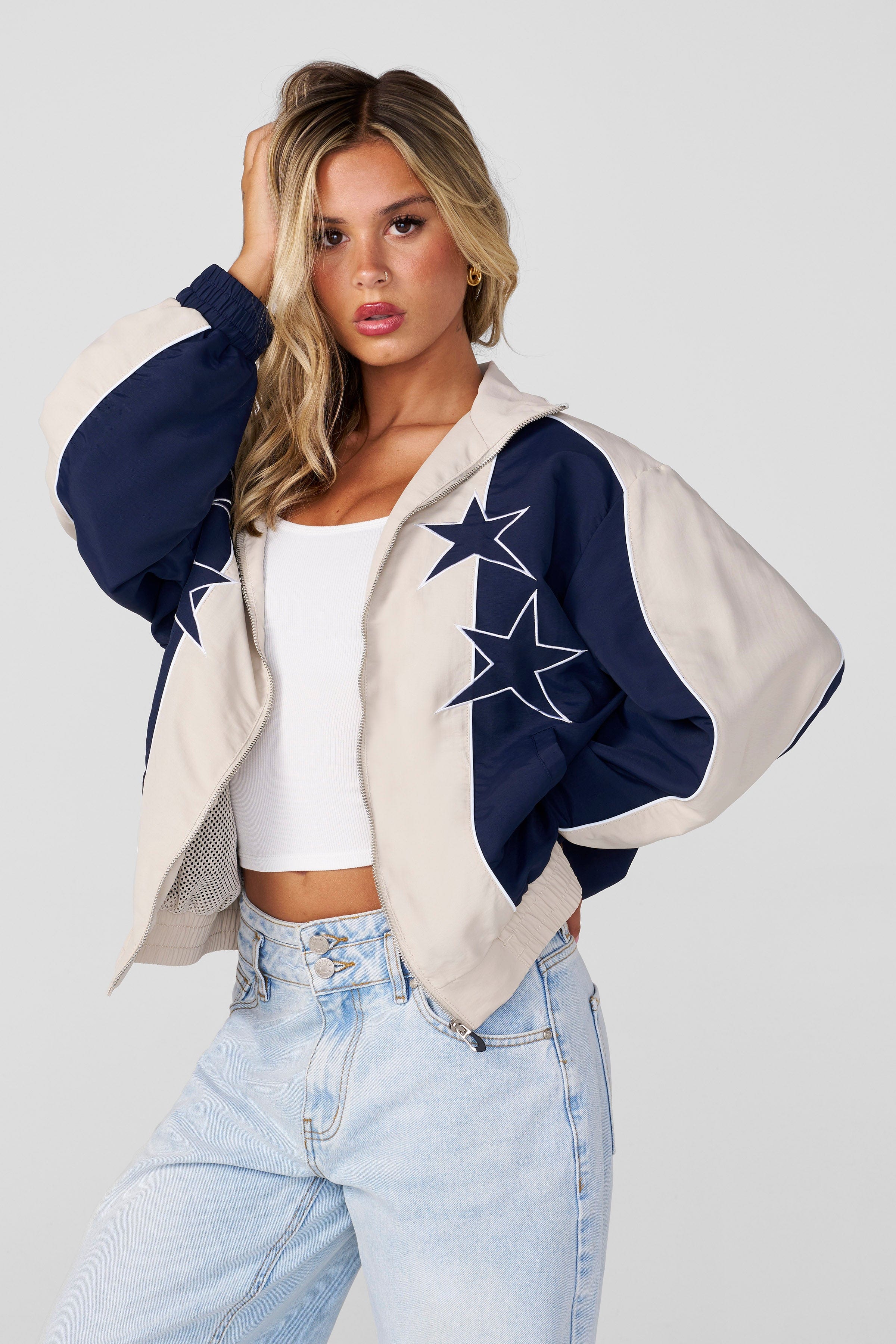 Front view of retro oversized windbreaker jacket, showcasing its relaxed fit.