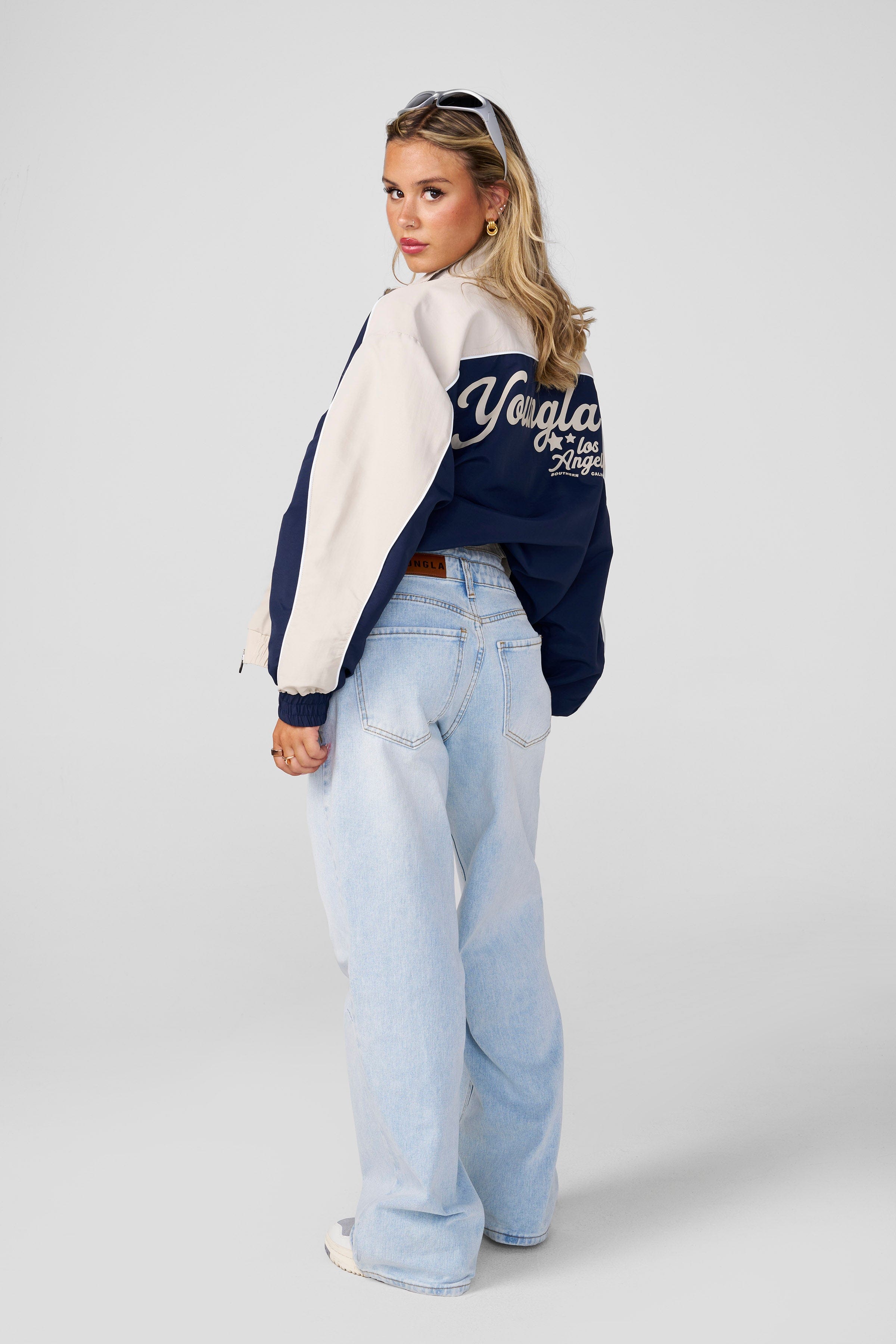 Side view of vintage jacket, highlighting the cozy mesh lining.