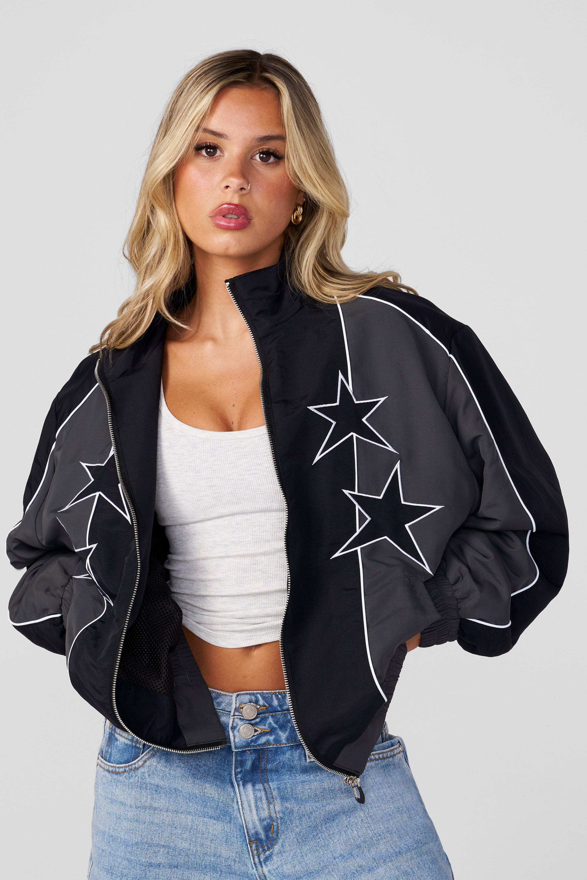 Side view of vintage jacket, highlighting the cozy mesh lining.