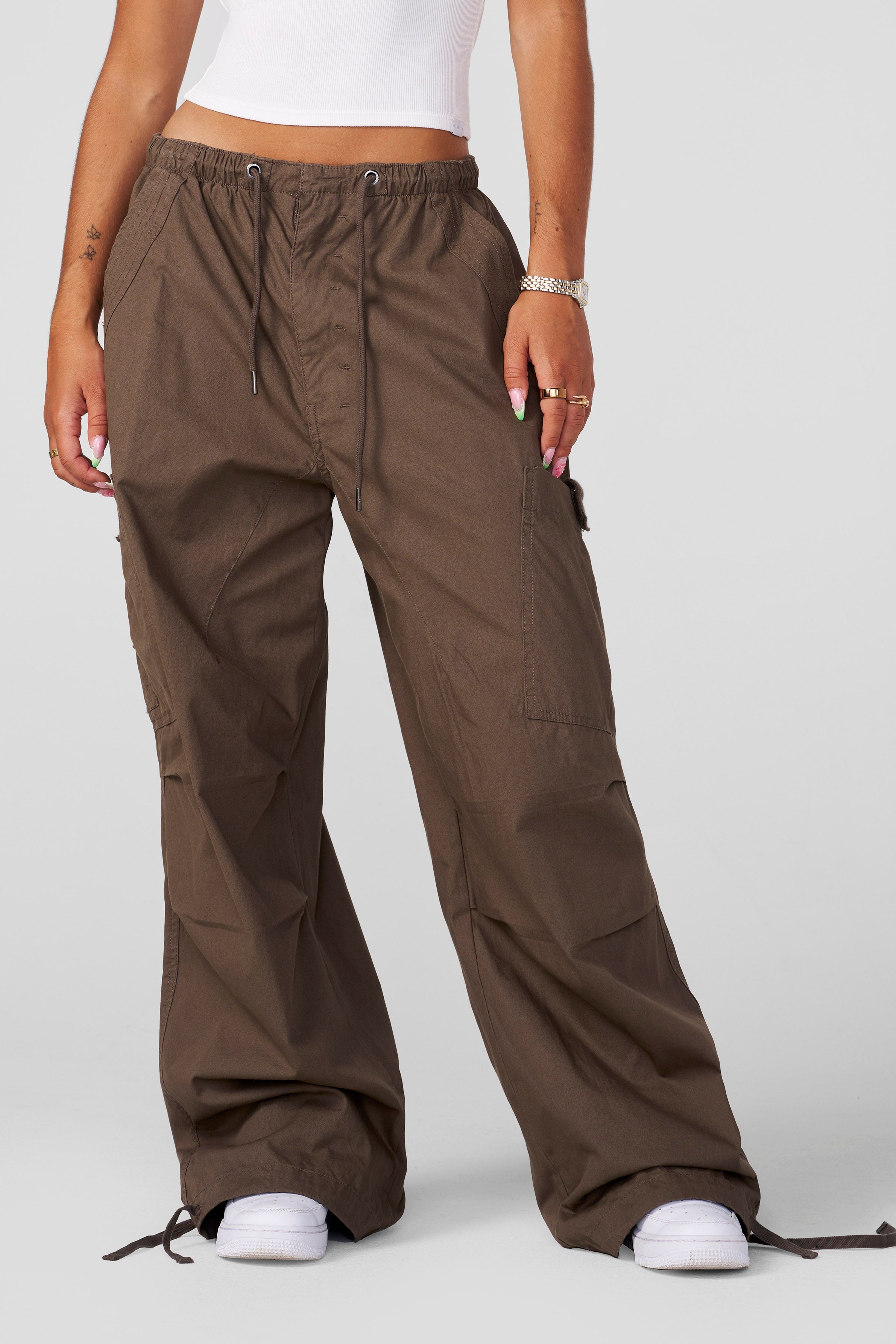 Close-up of cotton fabric texture and adjustable ankle ties